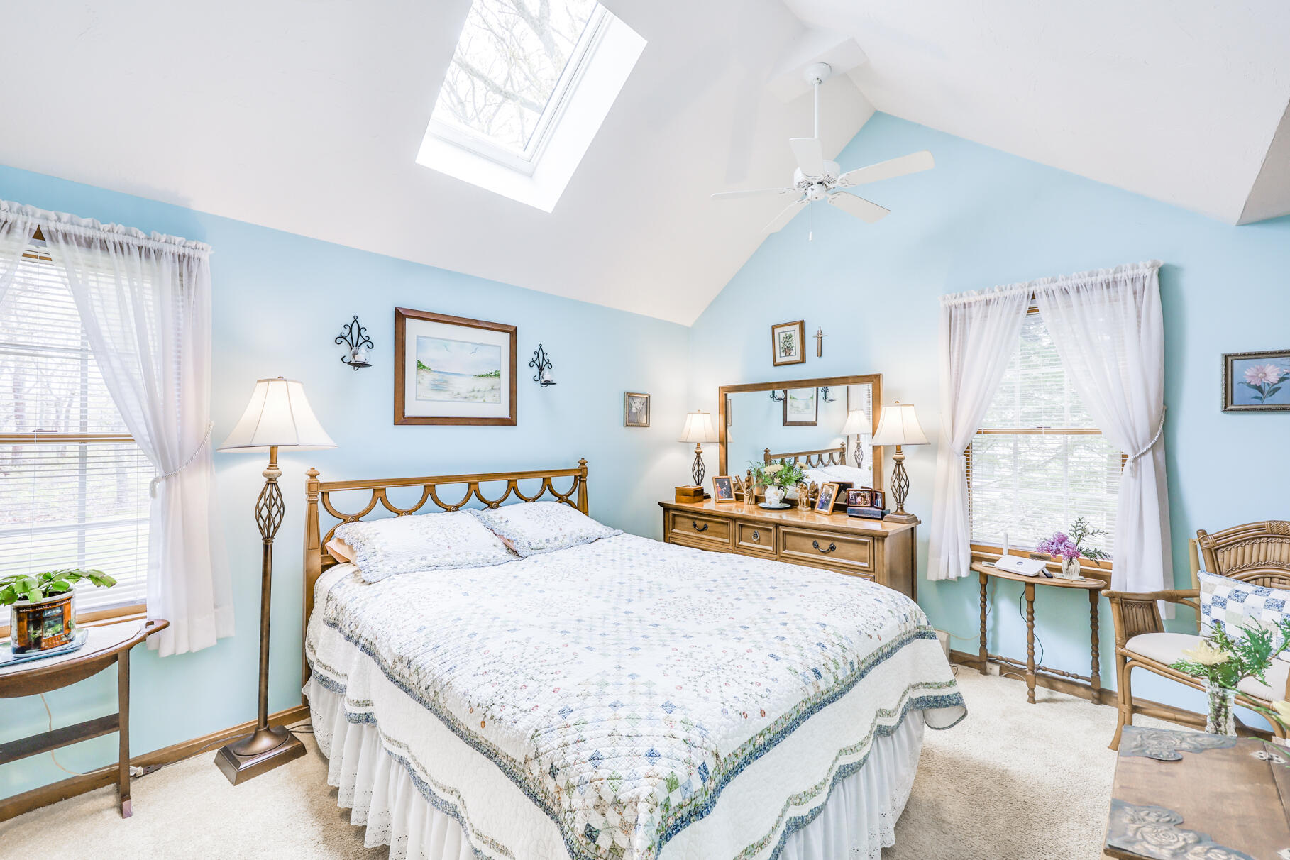 65 Continental Drive Harwich, MA 02645 - Photo 18 of 34 a bedroom with a large bed and a large window