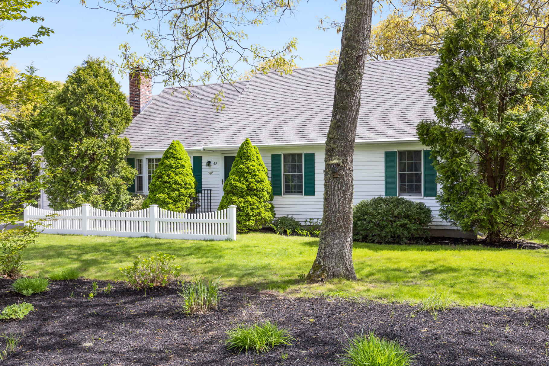 65 Continental Drive Harwich, MA 02645 - Photo 2 of 34 a view of house with backyard and garden