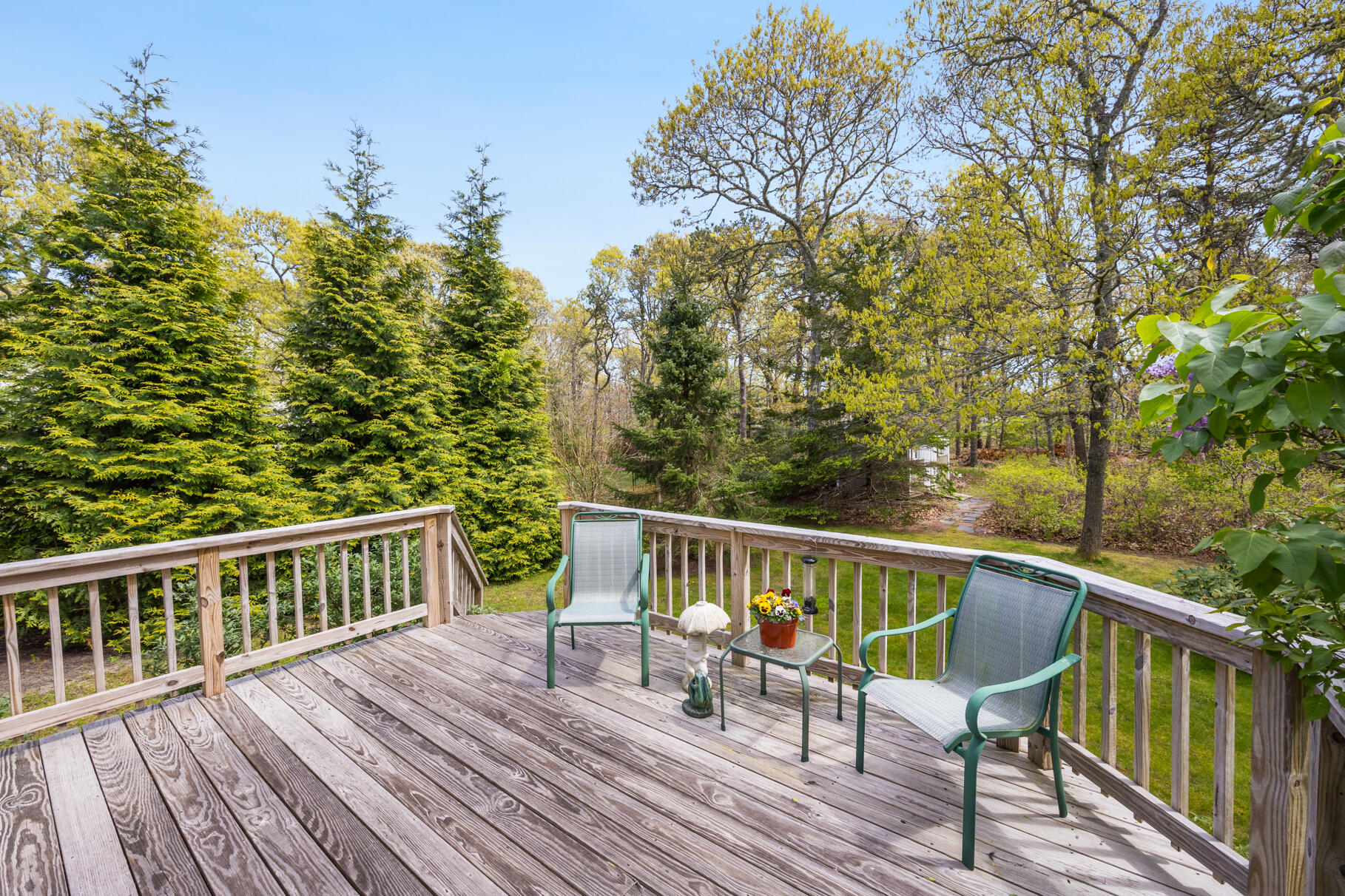 65 Continental Drive Harwich, MA 02645 - Photo 27 of 34 a view of a deck with wooden floor and fence