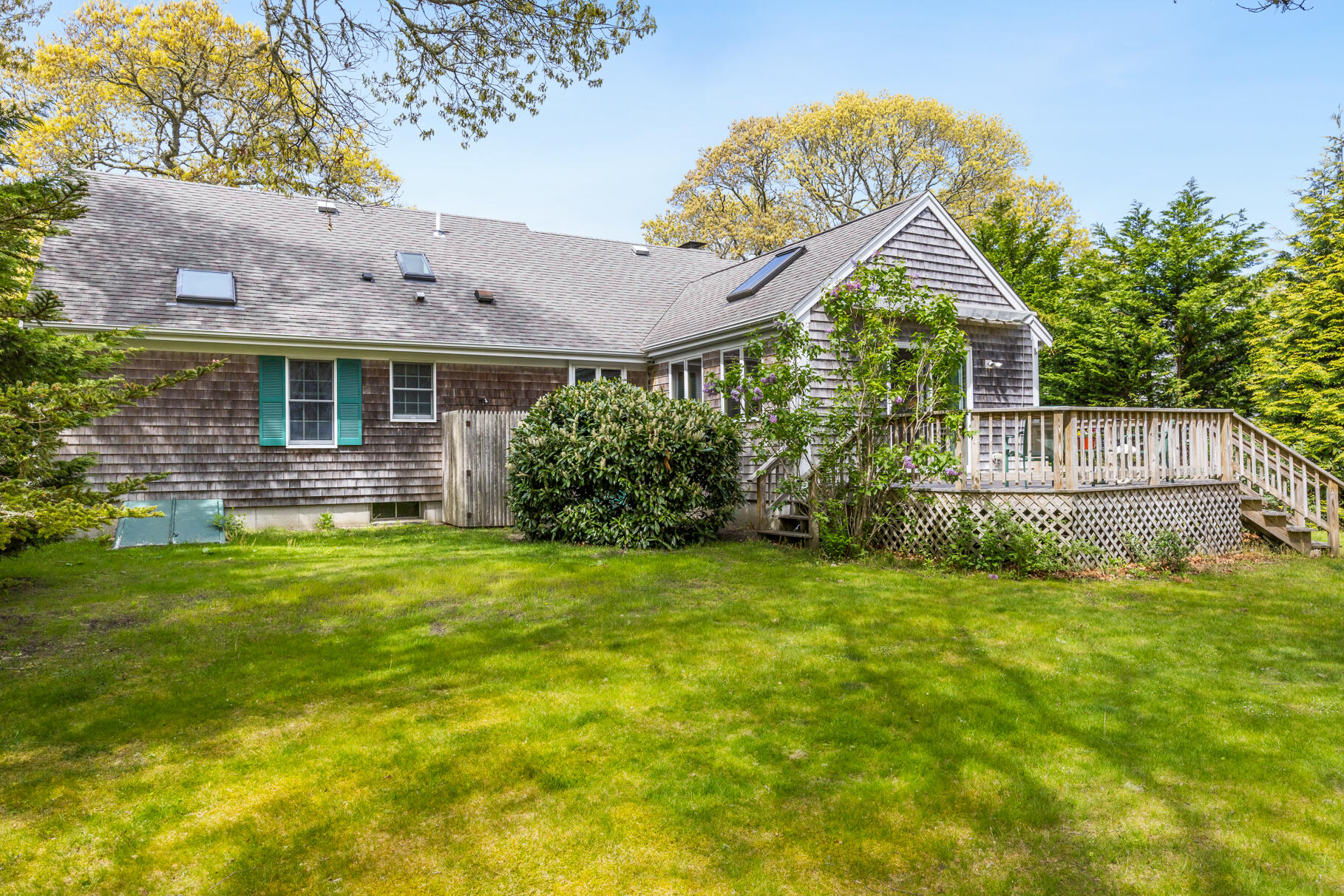 65 Continental Drive Harwich, MA 02645 - Photo 32 of 34 a front view of a house with garden