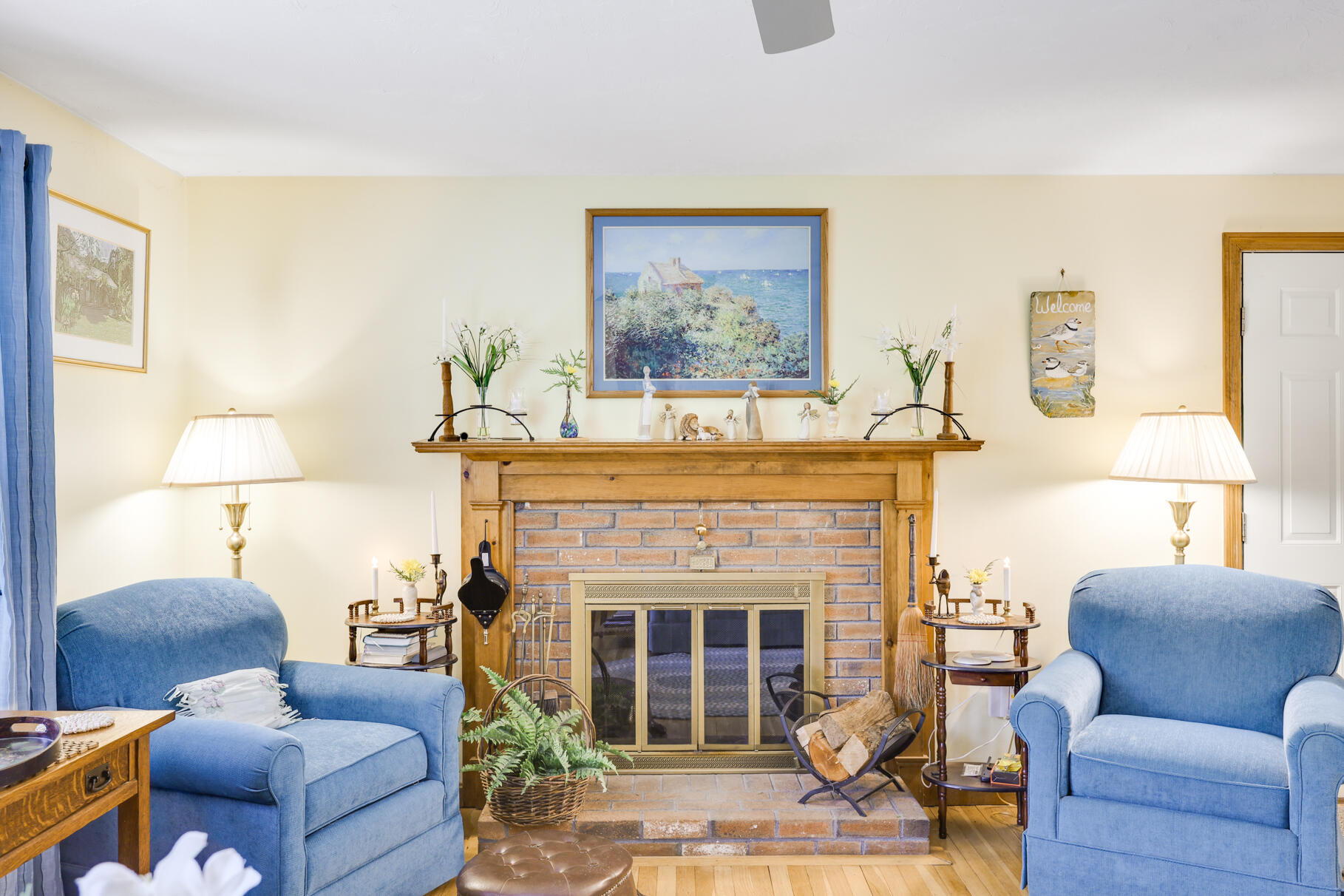 65 Continental Drive Harwich, MA 02645 - Photo 5 of 34 a living room with furniture and a fireplace