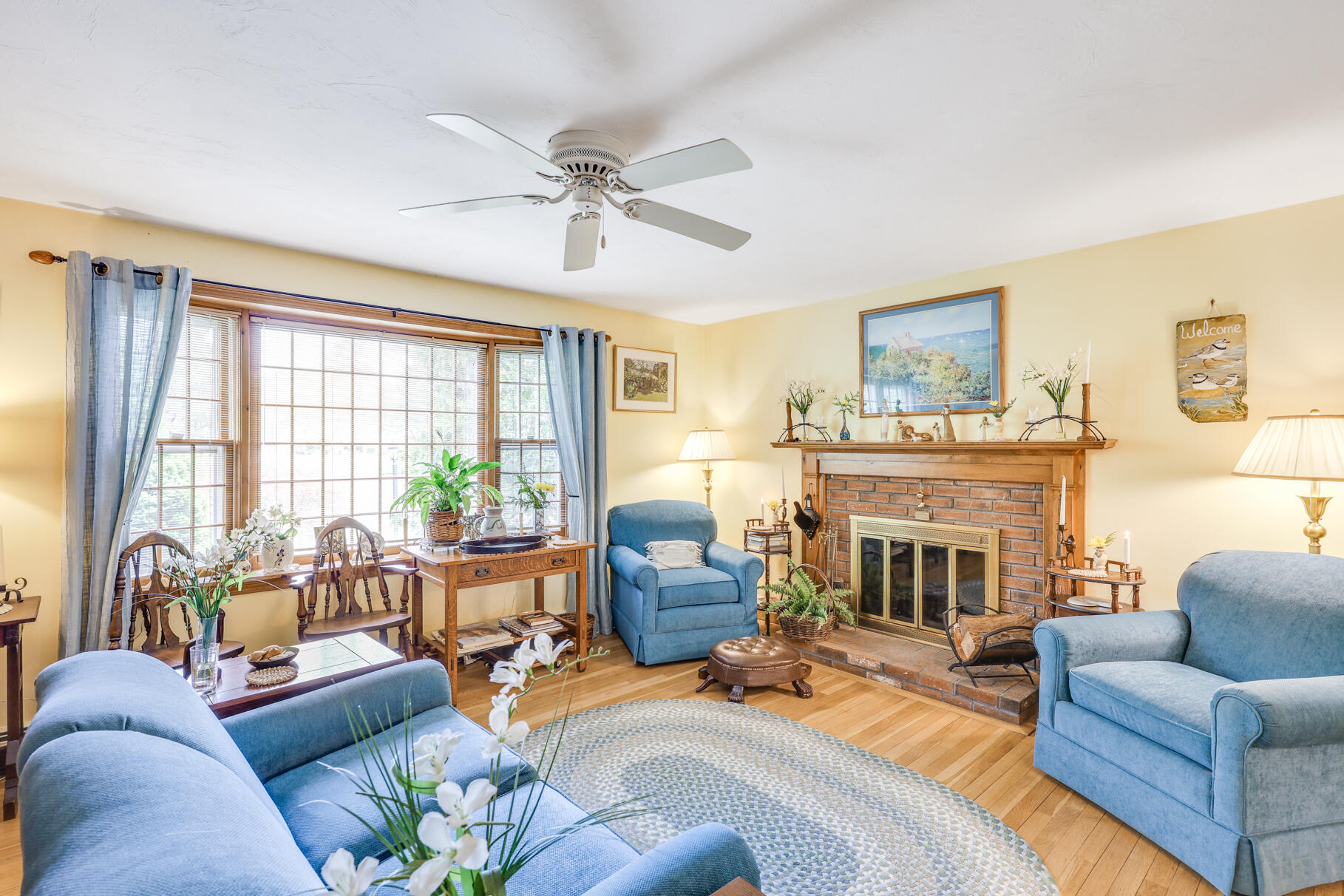 65 Continental Drive Harwich, MA 02645 - Photo 6 of 34 a living room with furniture and a fireplace