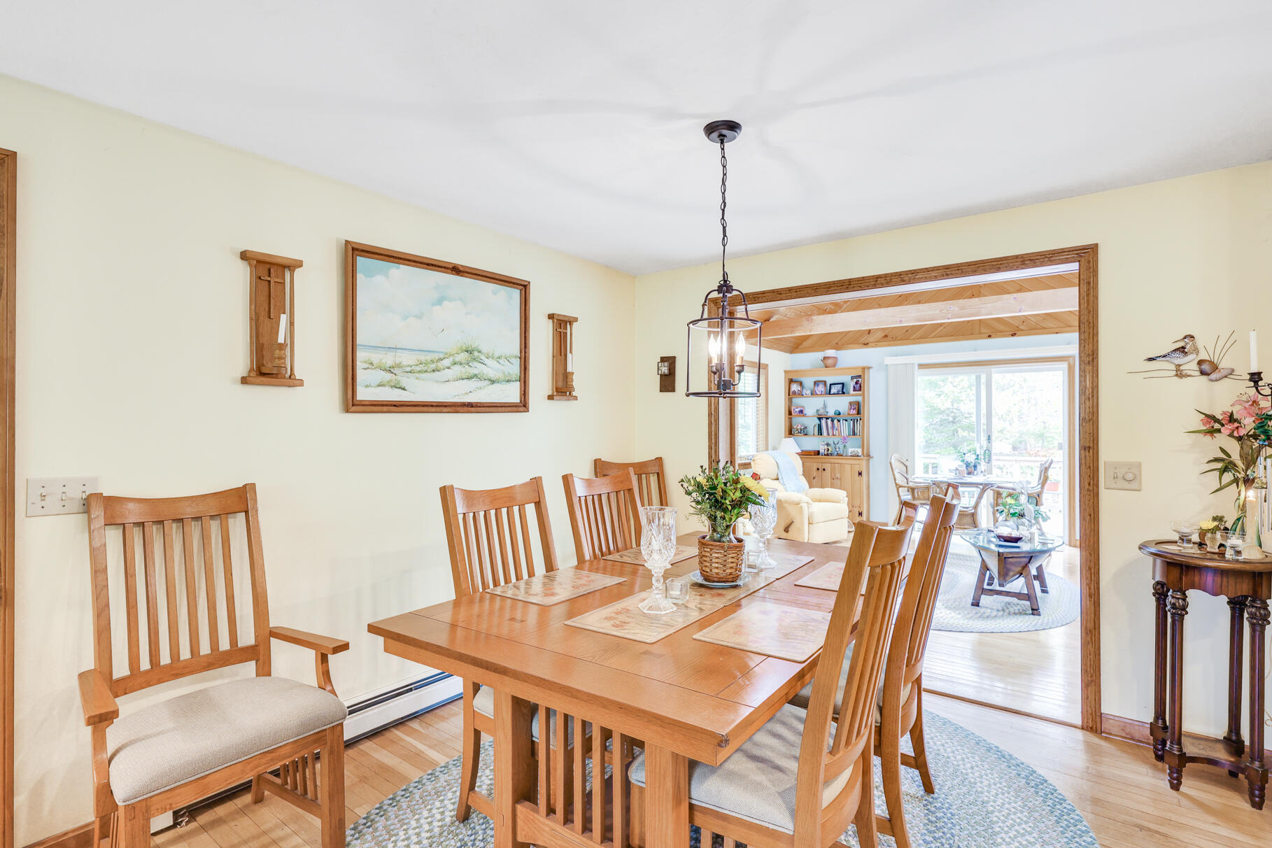 65 Continental Drive Harwich, MA 02645 - Photo 8 of 34 a view of a dining room with furniture window and wooden floor