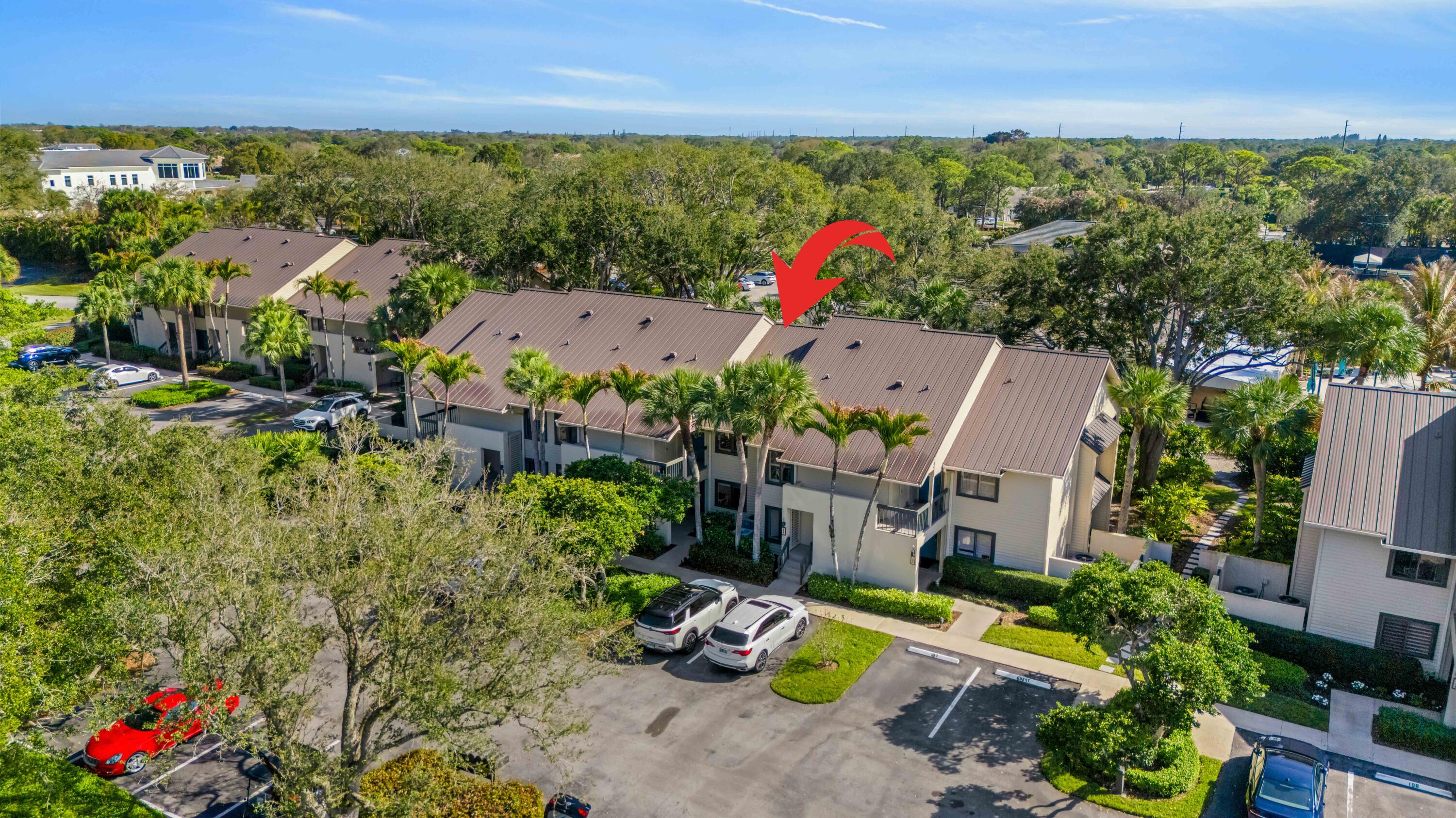 5172 Southeast Club Way, Unit 108 Stuart, FL 34997 - Photo 31 of 47 DJI_20260216144922_0348_Darrow