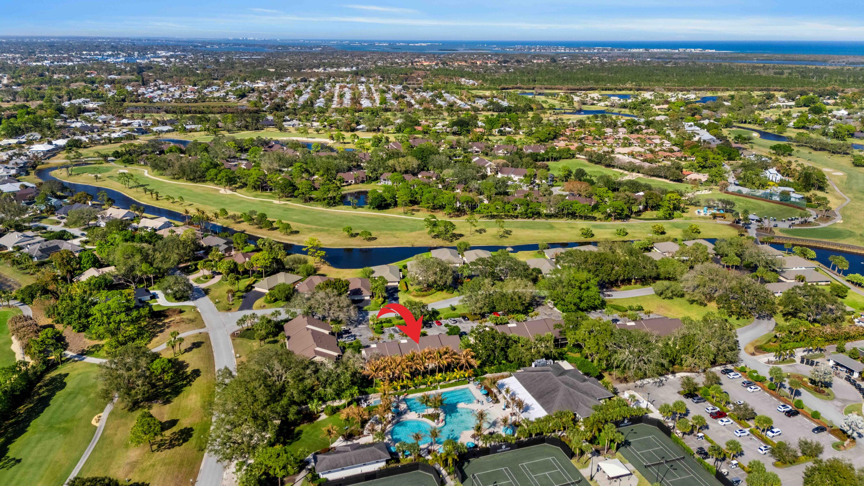 5172 Southeast Club Way, Unit 108 Stuart, FL 34997 - Photo 38 of 47 DJI_20260216144833_0343_Darrow