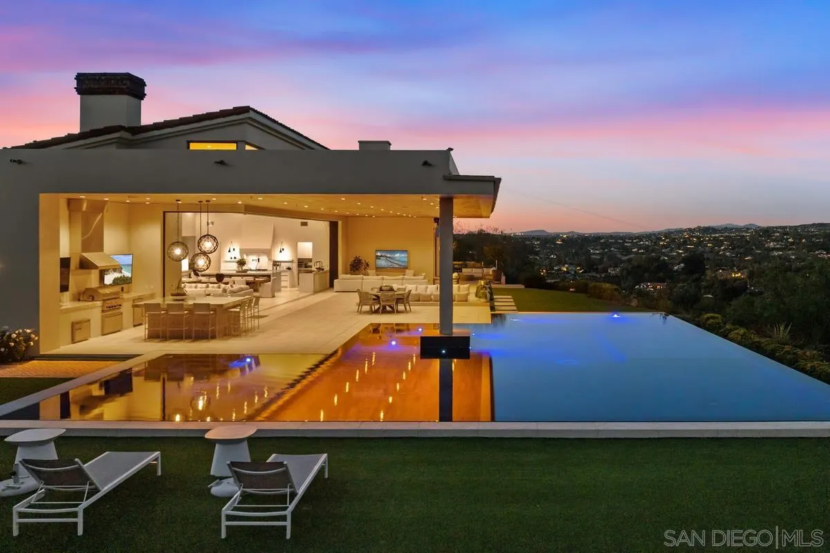 5516 La Crescenta Road Rancho Santa Fe, CA 92067 - Photo 40 of 49 a view of a house with a yard