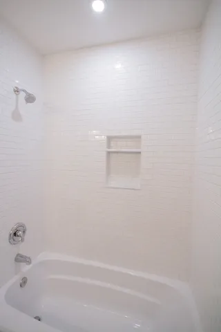 a bathroom with a bathtub