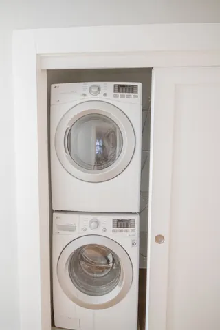 a utility room with dryer and washer