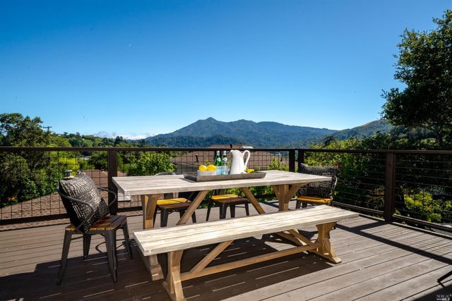 a view of a patio with furniture