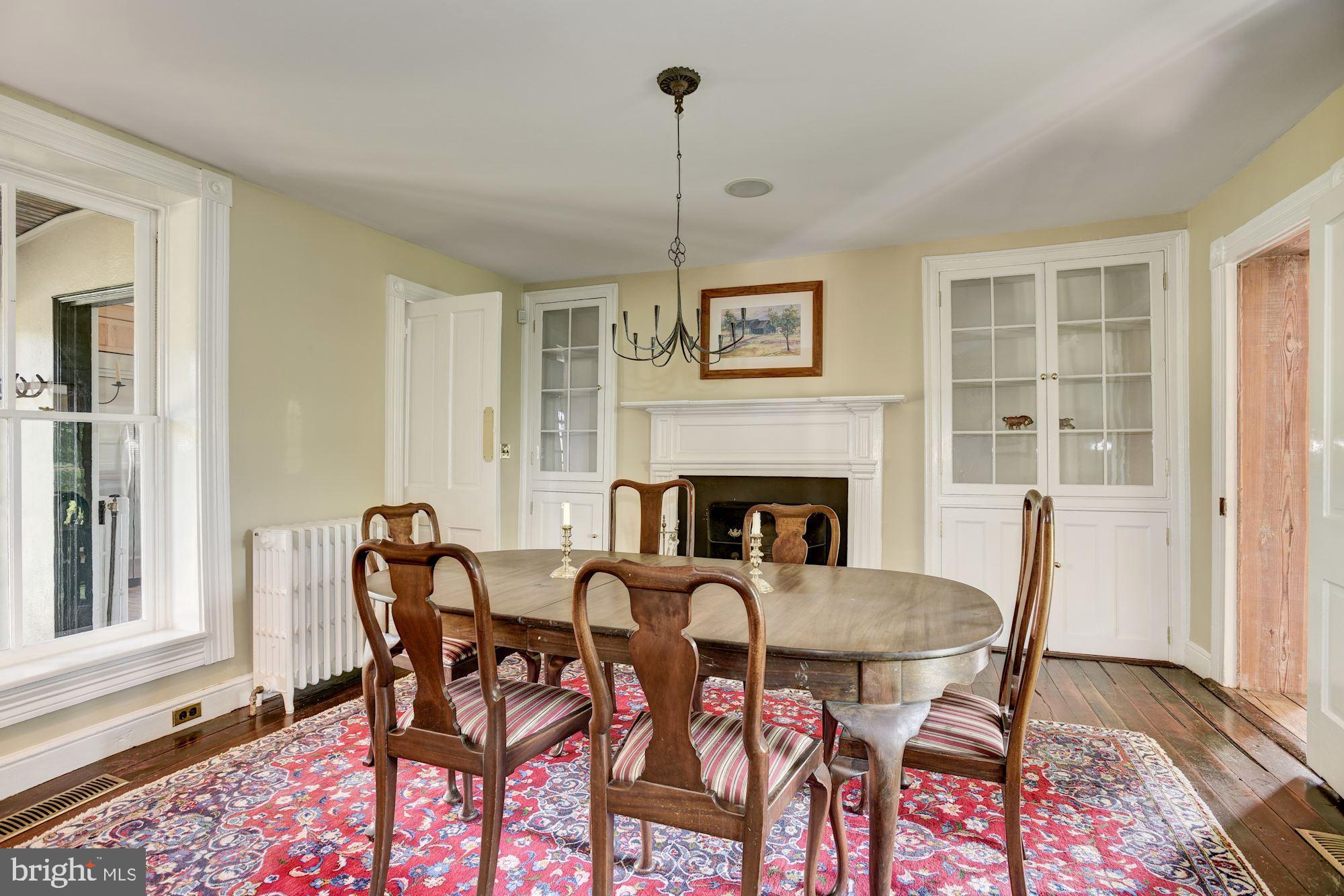 20985 Unison Road Middleburg, VA 20117 - Photo 14 of 48 Dining room with fireplace and built ins.