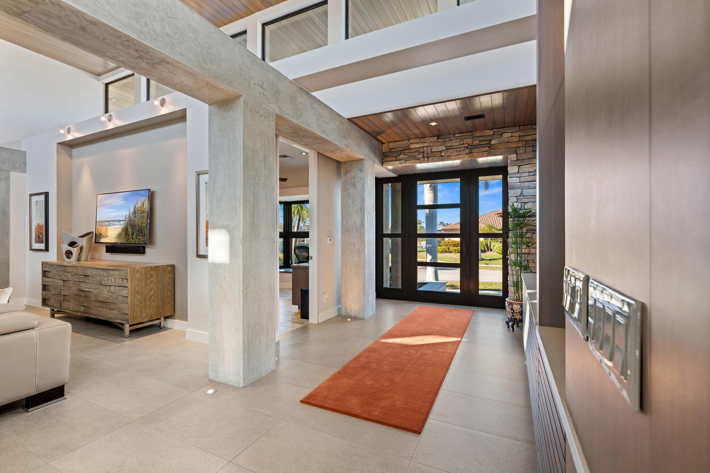 821 Magnolia Court Marco Island, FL 34145 - Photo 2 of 53 a living room with furniture and a large window