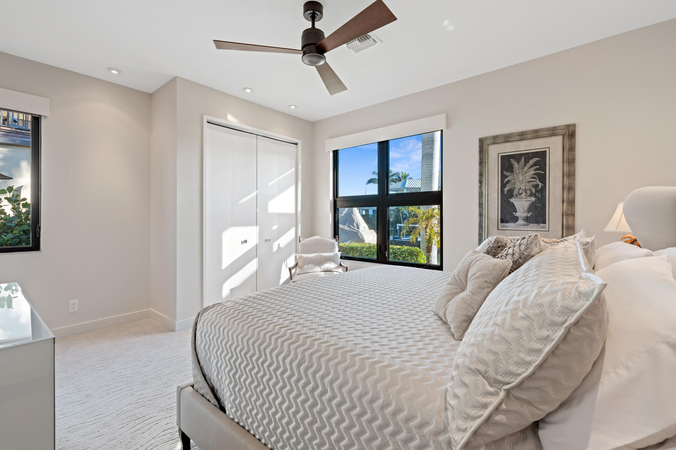 821 Magnolia Court Marco Island, FL 34145 - Photo 22 of 53 a bedroom with a large bed and a window
