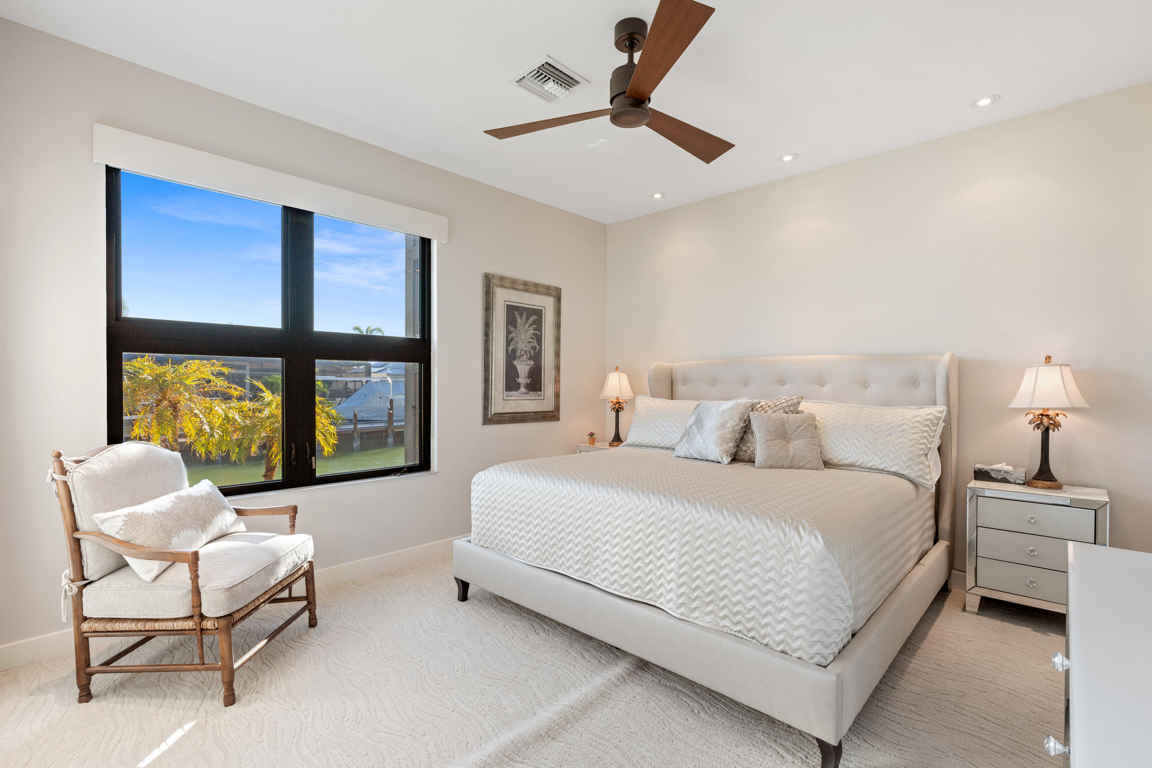 821 Magnolia Court Marco Island, FL 34145 - Photo 23 of 53 a spacious bedroom with a bed and a couch