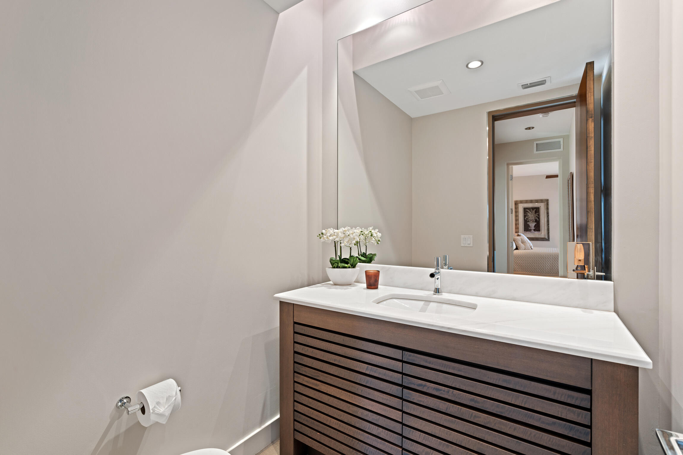 821 Magnolia Court Marco Island, FL 34145 - Photo 34 of 53 a bathroom with a sink and a mirror