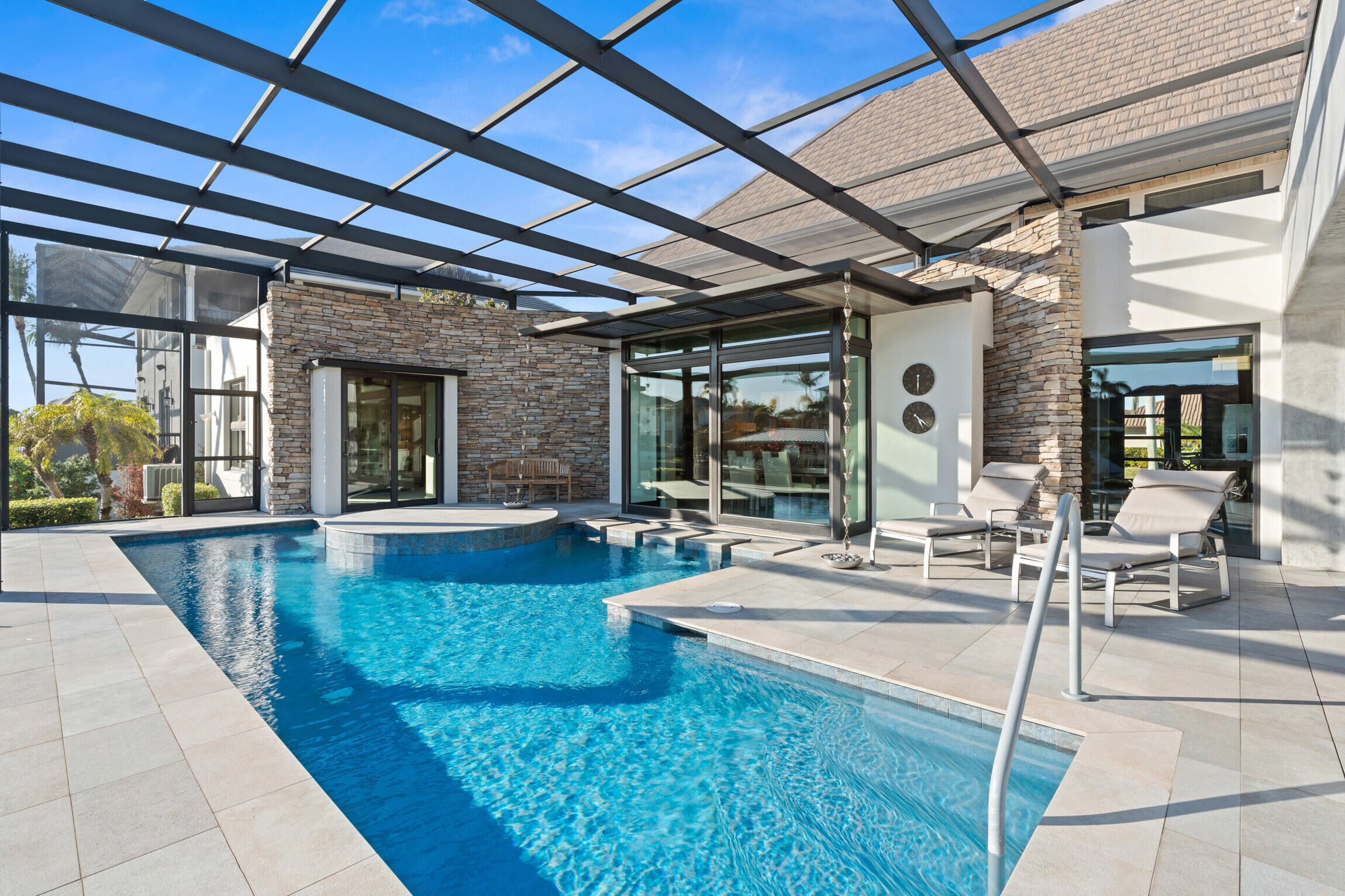 821 Magnolia Court Marco Island, FL 34145 - Photo 40 of 53 a view of a patio with dining table and chairs with wooden floor