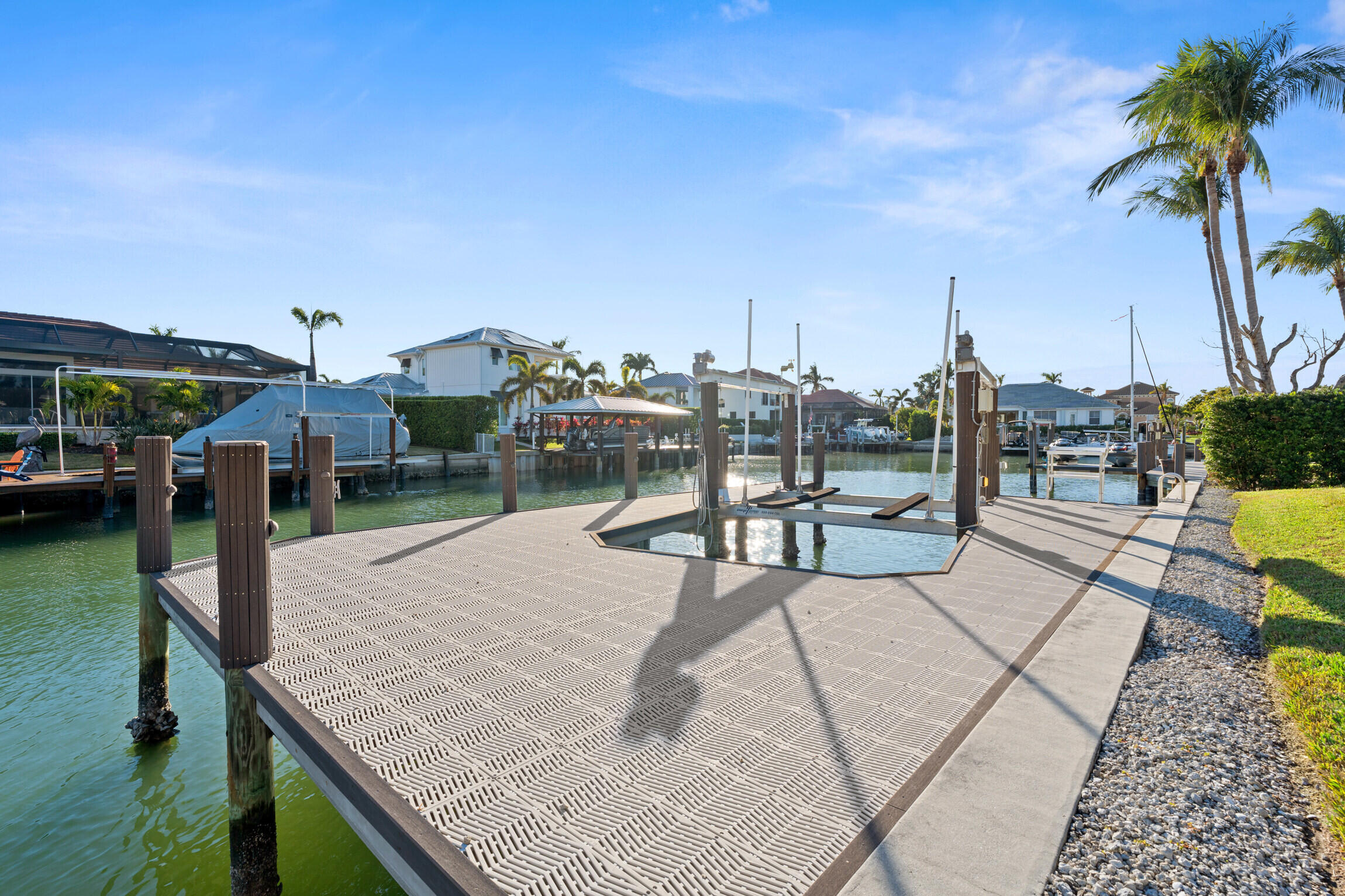 821 Magnolia Court Marco Island, FL 34145 - Photo 43 of 53 a view of a backyard with sitting area