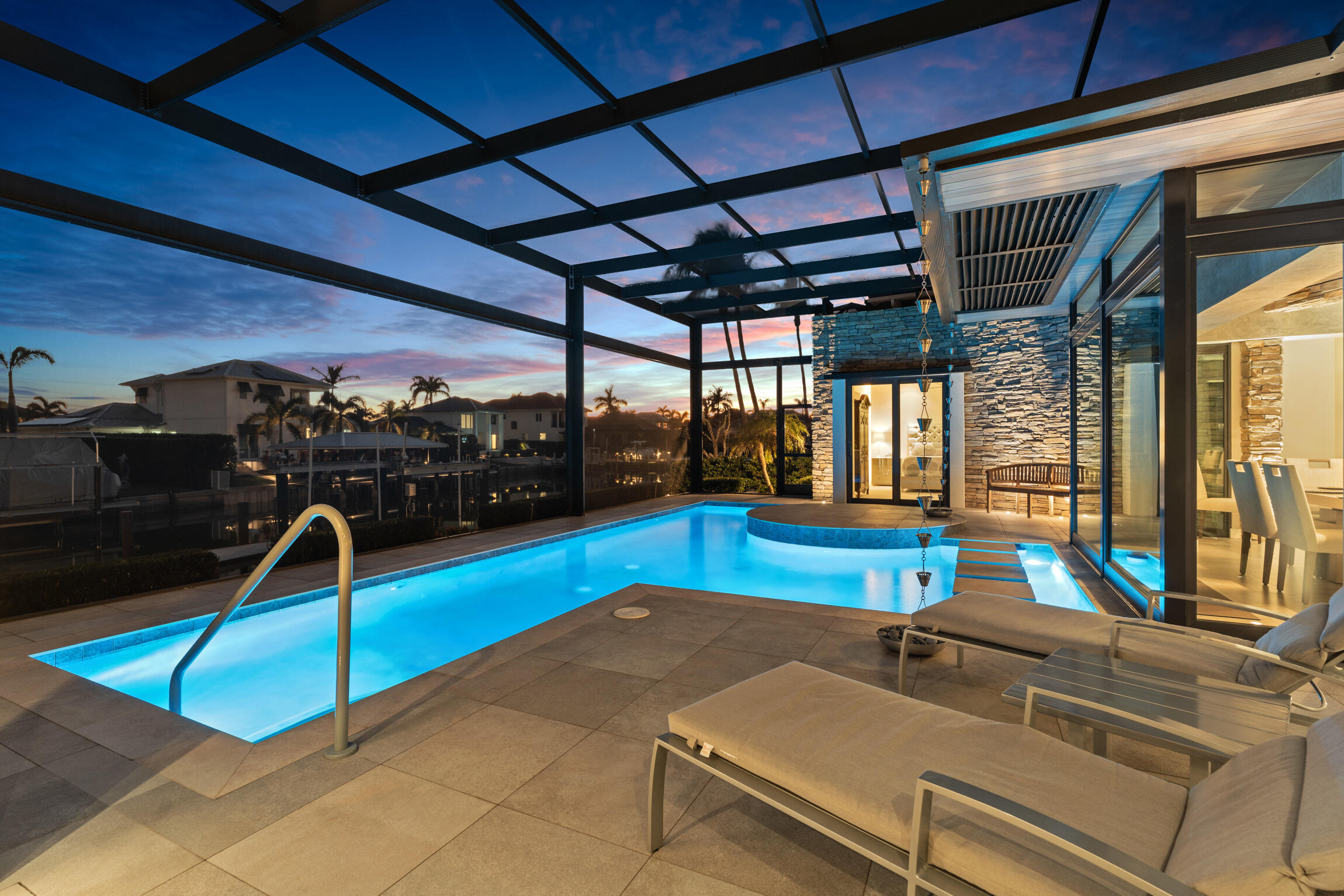 821 Magnolia Court Marco Island, FL 34145 - Photo 47 of 53 a view of a swimming pool with a patio