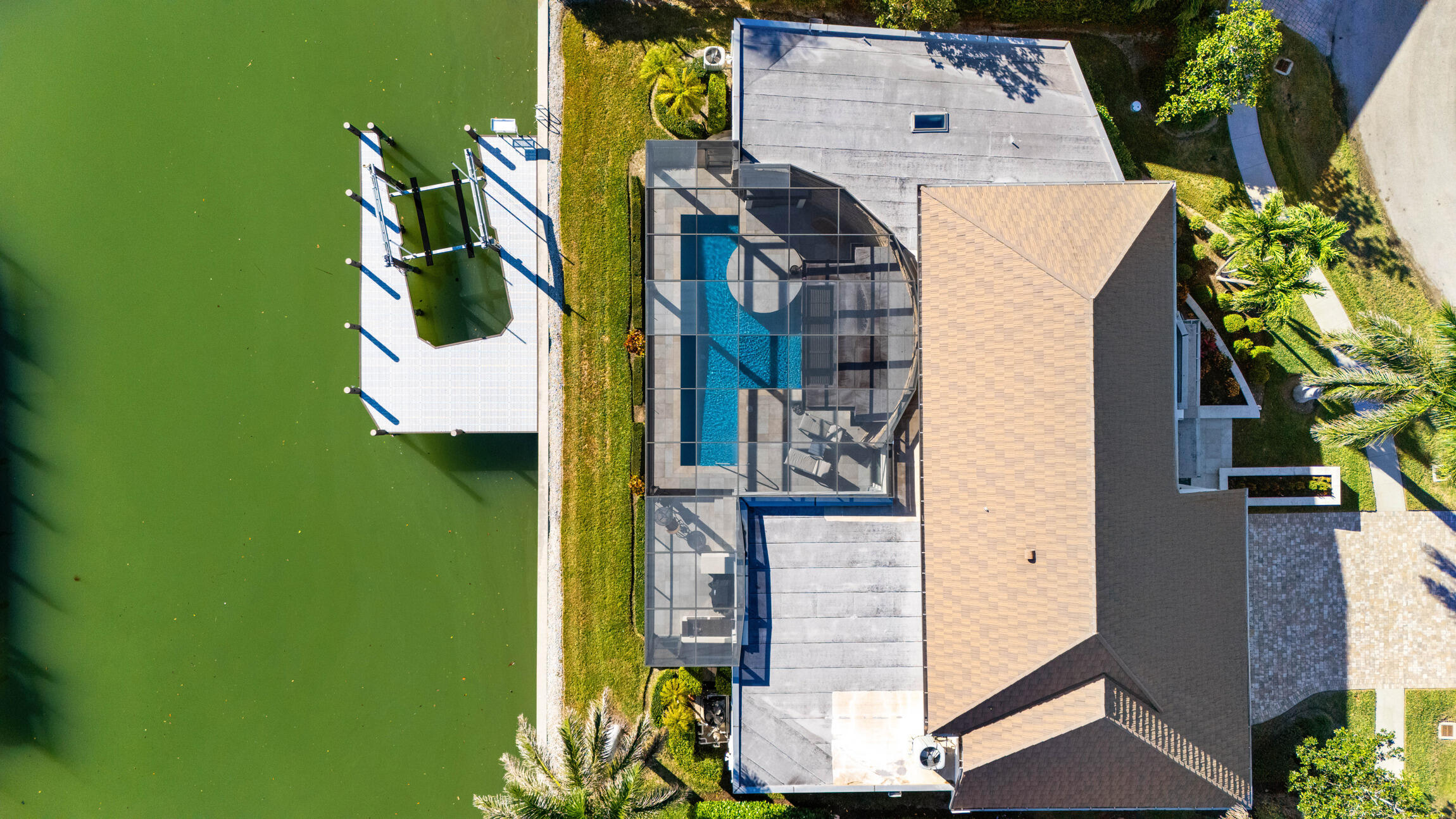 821 Magnolia Court Marco Island, FL 34145 - Photo 50 of 53 an aerial view of a house with a garden