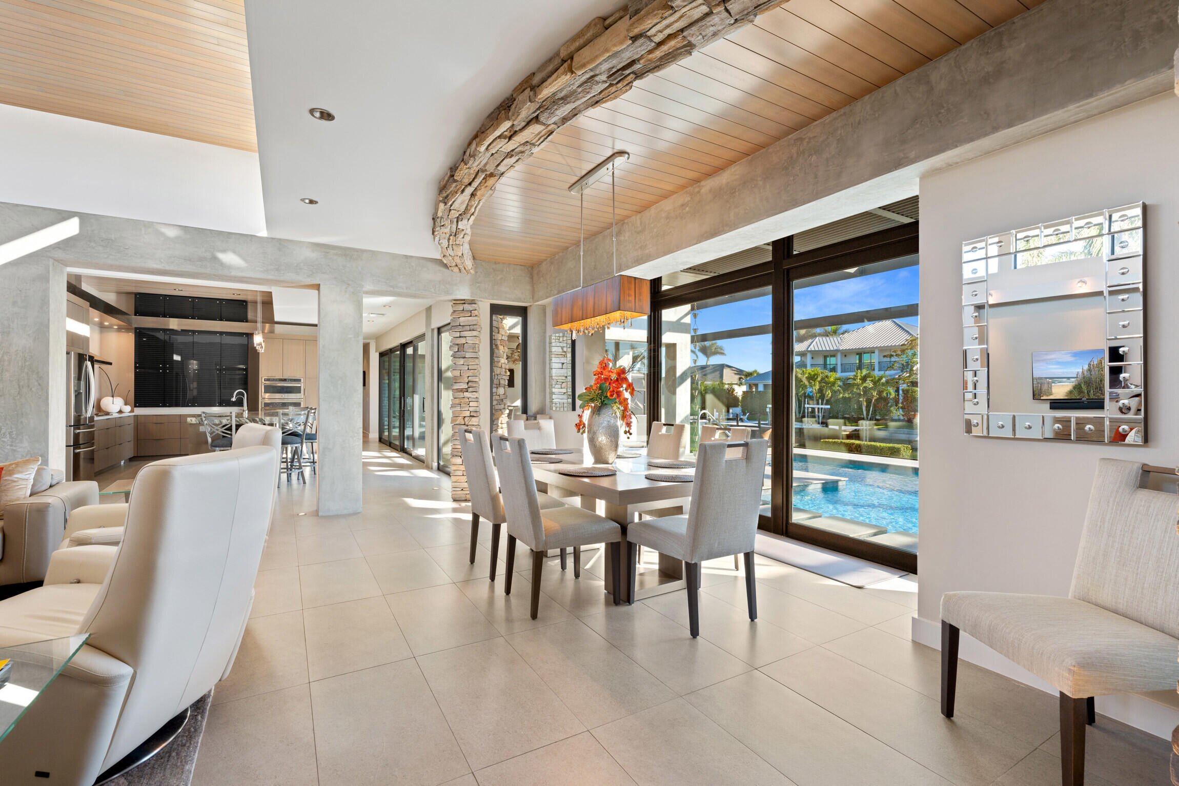 821 Magnolia Court Marco Island, FL 34145 - Photo 5 of 53 a dining area with furniture and a large window