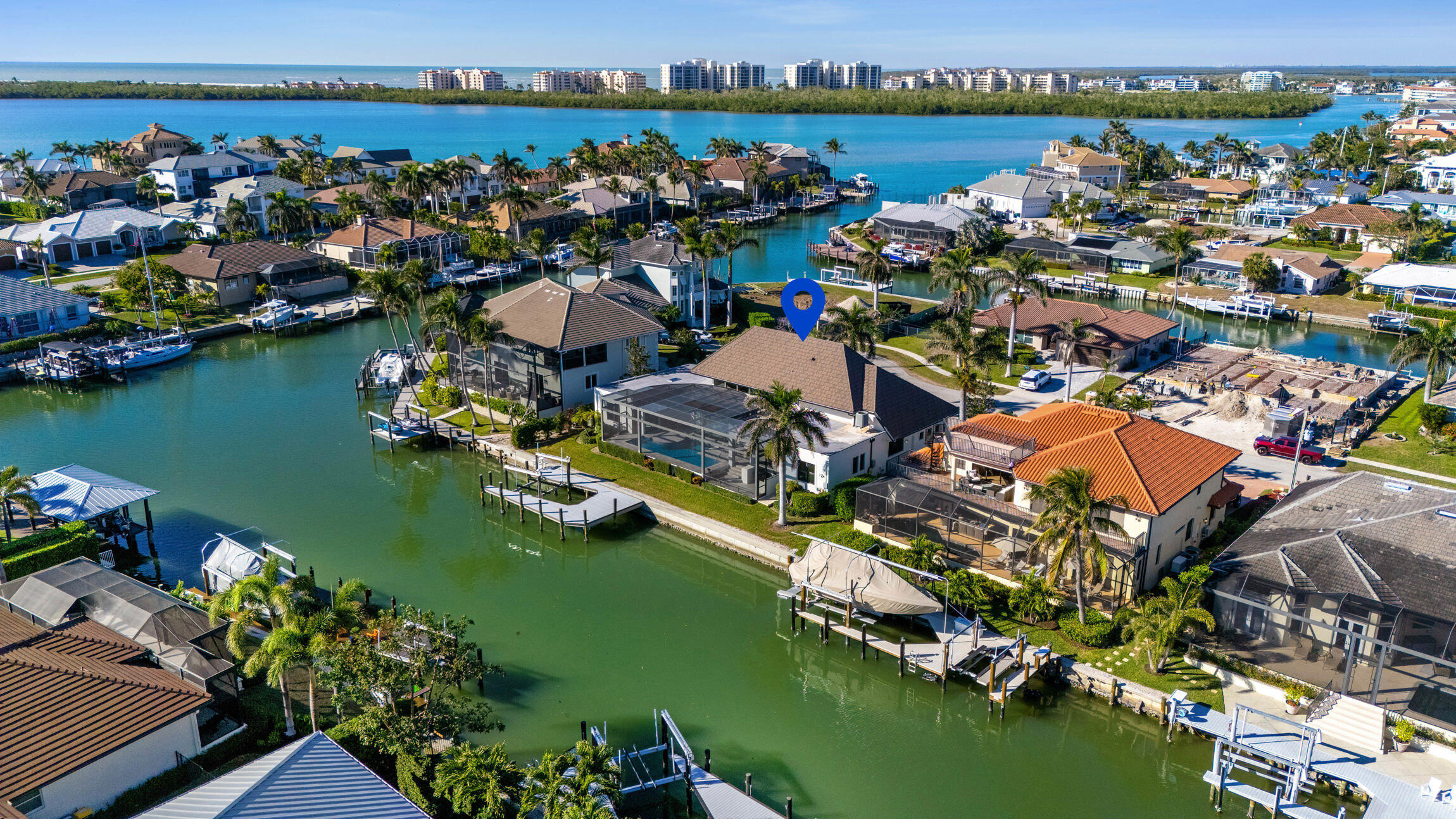 821 Magnolia Court Marco Island, FL 34145 - Photo 53 of 53 an aerial view of a house with a lake view
