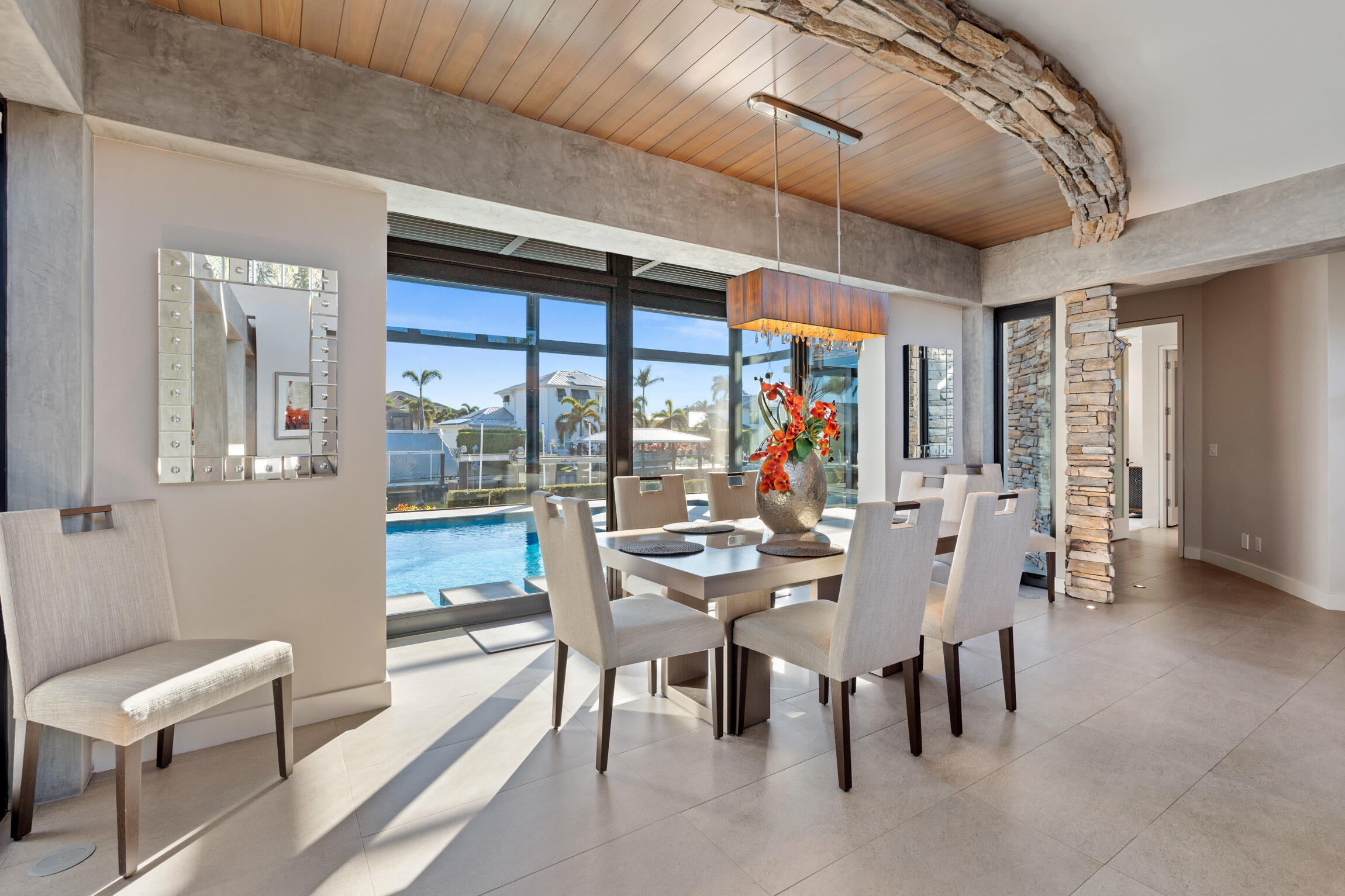 821 Magnolia Court Marco Island, FL 34145 - Photo 9 of 53 a view of a dining room with furniture wooden floor and chandelier