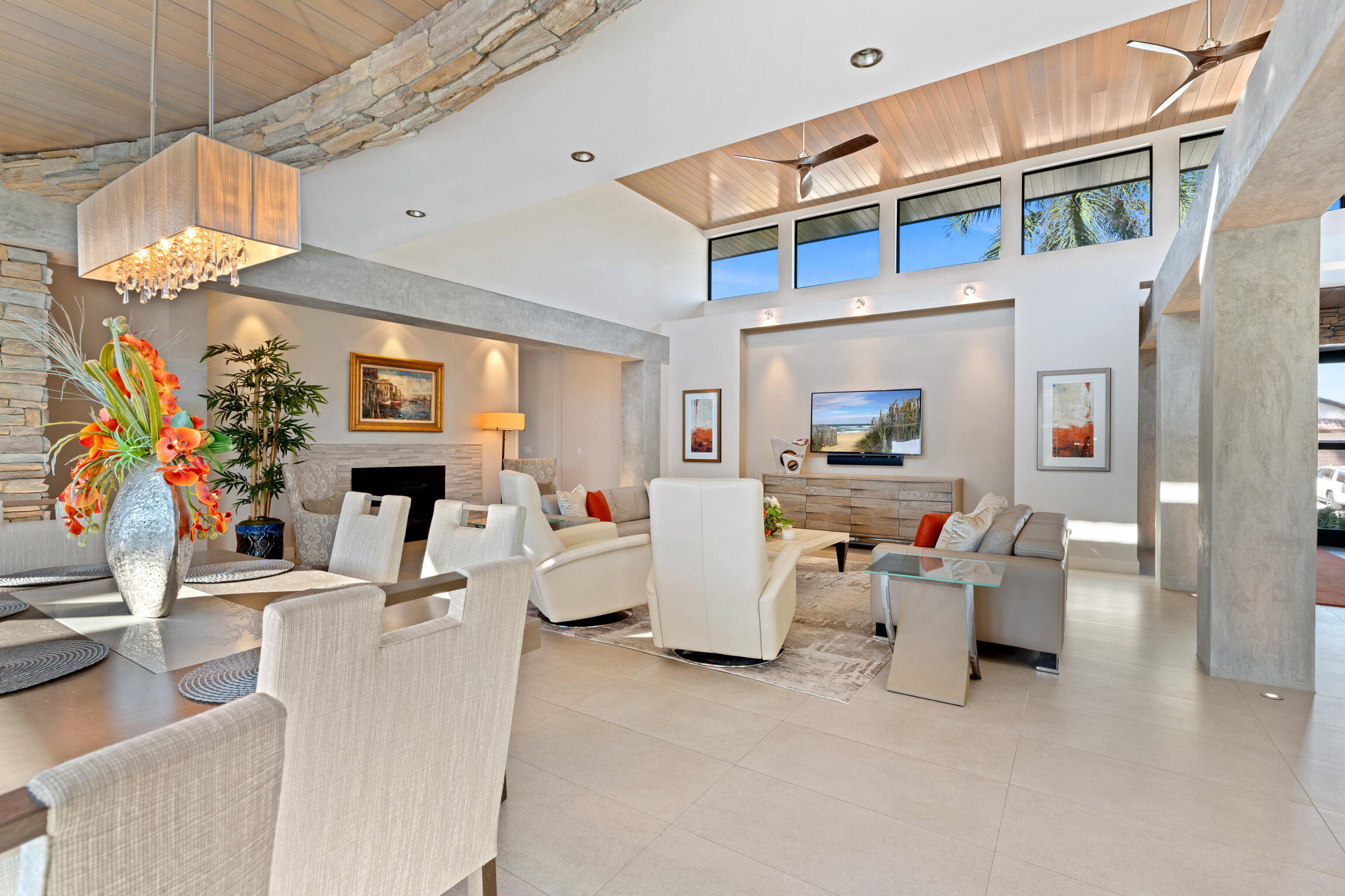 821 Magnolia Court Marco Island, FL 34145 - Photo 10 of 53 a living room with furniture a fireplace and a chandelier