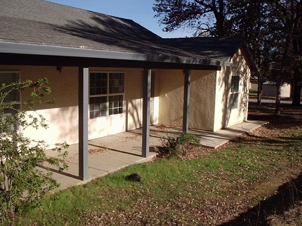 7487 White Oak Road Corning, CA 96021 - Photo 3 of 3 a backyard of a house with lots of green space