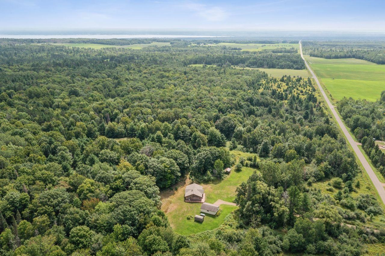 75920 Ondossagon Road Washburn, WI 54891 - Photo 27 of 29 Aerial view of sparsely populated area with a heavily wooded area