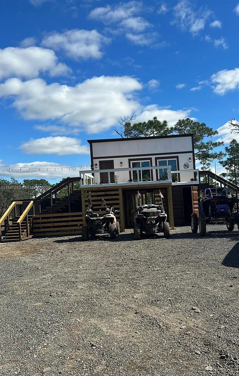 0 Main Grade Road Frostproof, FL 33843 - Photo 16 of 23 a view of a house with wooden fence