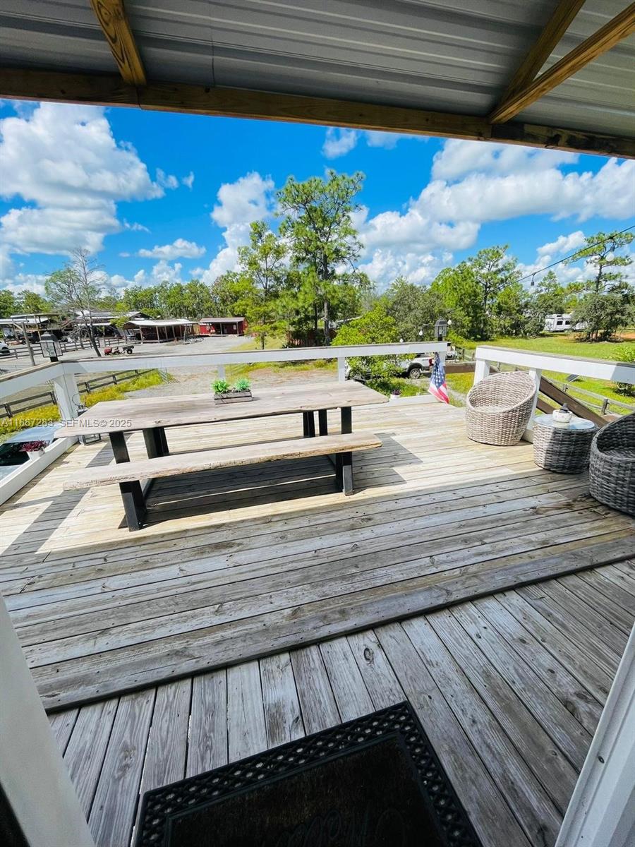 0 Main Grade Road Frostproof, FL 33843 - Photo 2 of 23 a view of swimming pool with outdoor seating