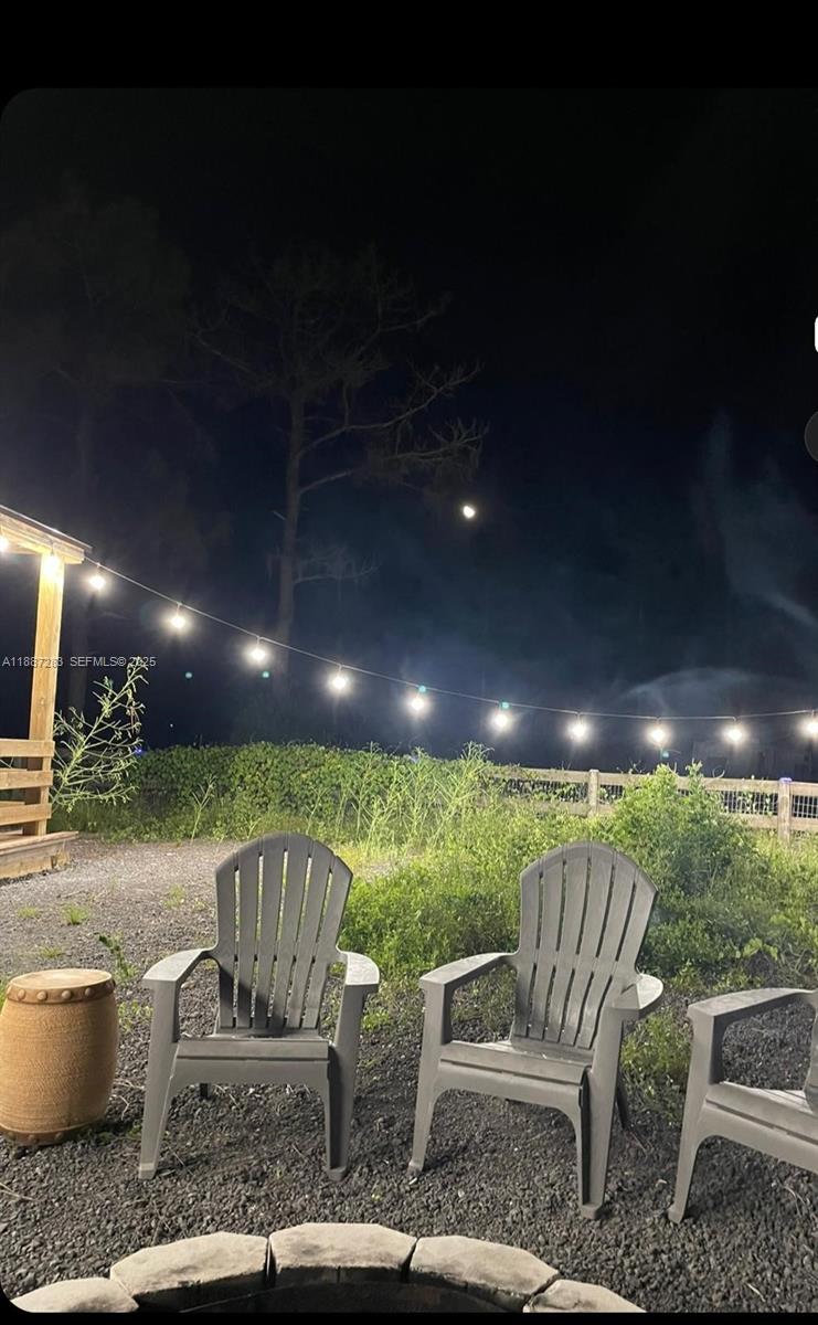 0 Main Grade Road Frostproof, FL 33843 - Photo 21 of 23 a view of a porch with furniture and garden