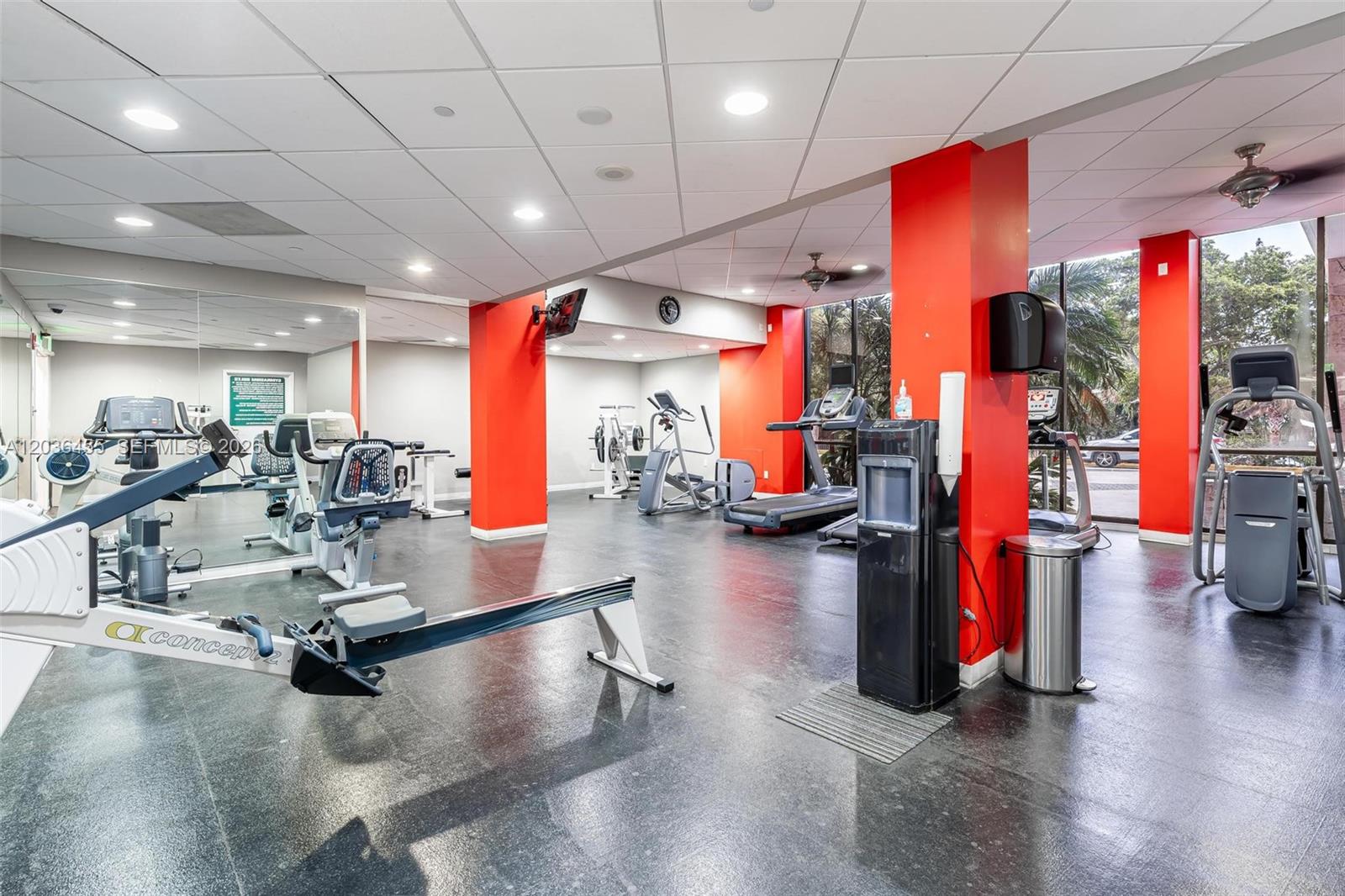 780 Northeast 69th Street, Unit 1010 Miami, FL 33138 - Photo 30 of 31 a view of a room with gym equipment