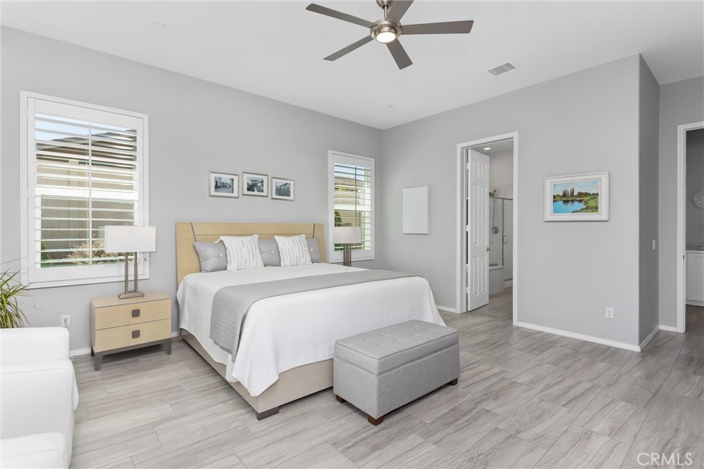 1545 Rio Grande Beaumont, CA 92223 - Photo 22 of 34 a bedroom with a bed and a window