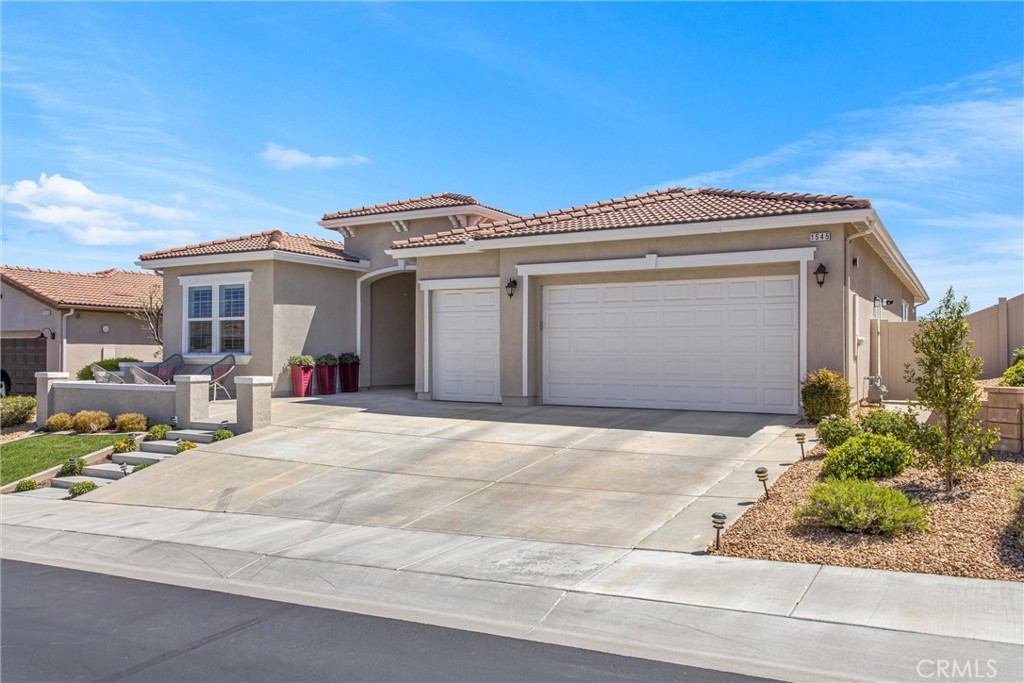 1545 Rio Grande Beaumont, CA 92223 - Photo 3 of 34 a view of a white house with a outdoor space
