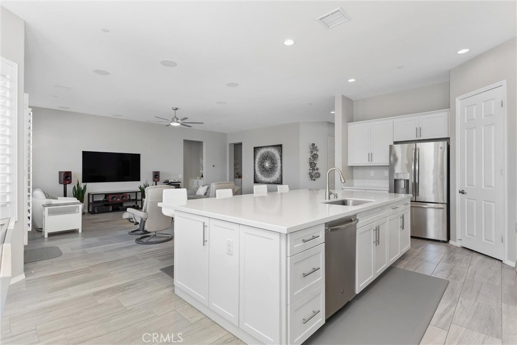 1545 Rio Grande Beaumont, CA 92223 - Photo 10 of 34 a kitchen with stainless steel appliances a sink stove and refrigerator