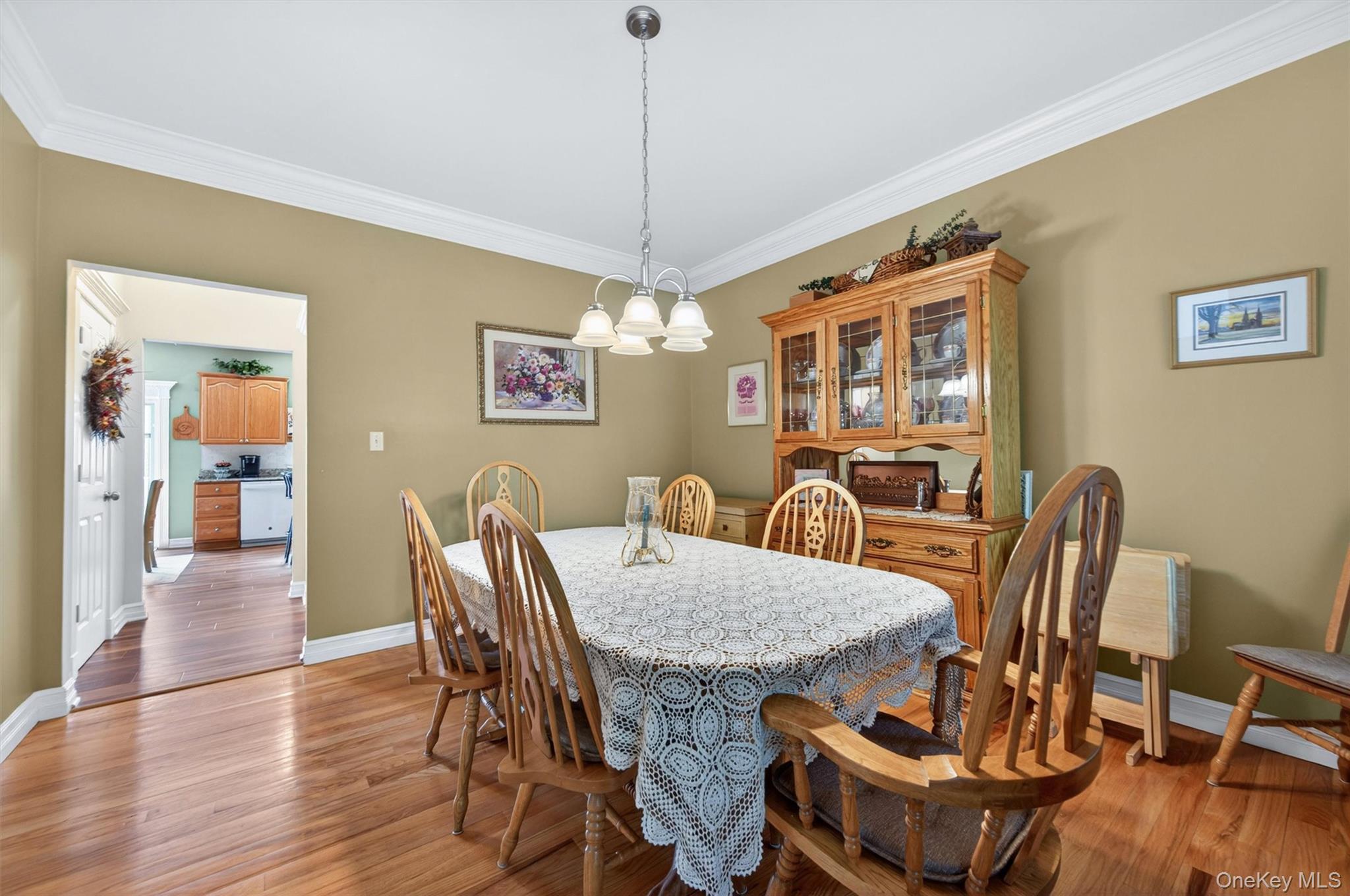 19 Pirog Road Pine Bush, NY 12566 - Photo 7 of 50 a view of a dining room with furniture wooden floor and chandelier