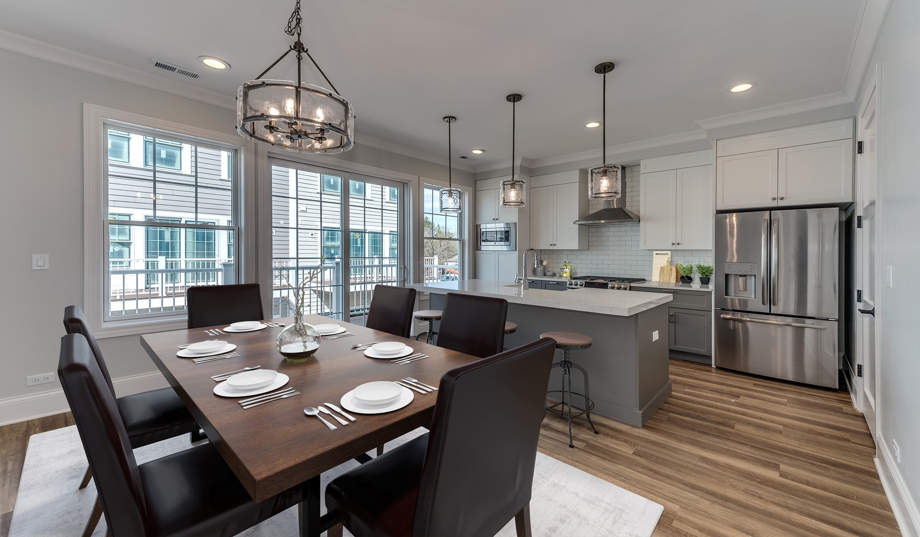 1171 South Eldridge Lane Elmhurst, IL 60126 - Photo 2 of 18 a kitchen with a dining table and chairs