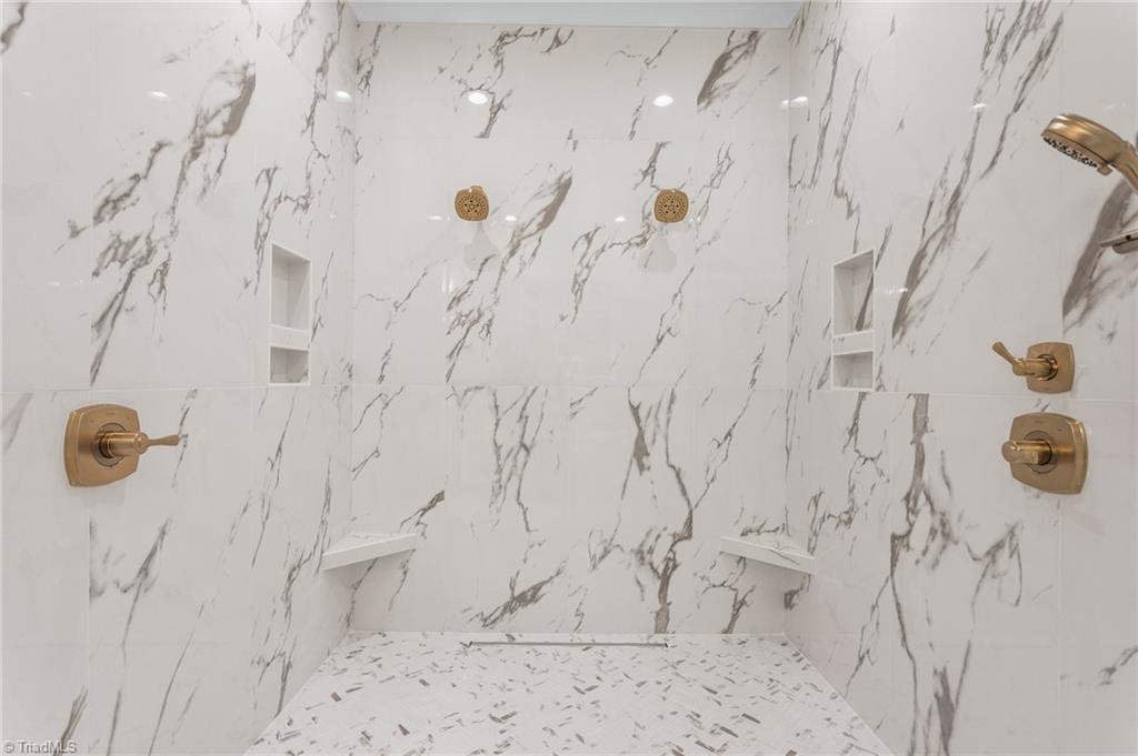 8015 Cranston Court Oak Ridge, NC 27310 - Photo 22 of 46 shower in wet room