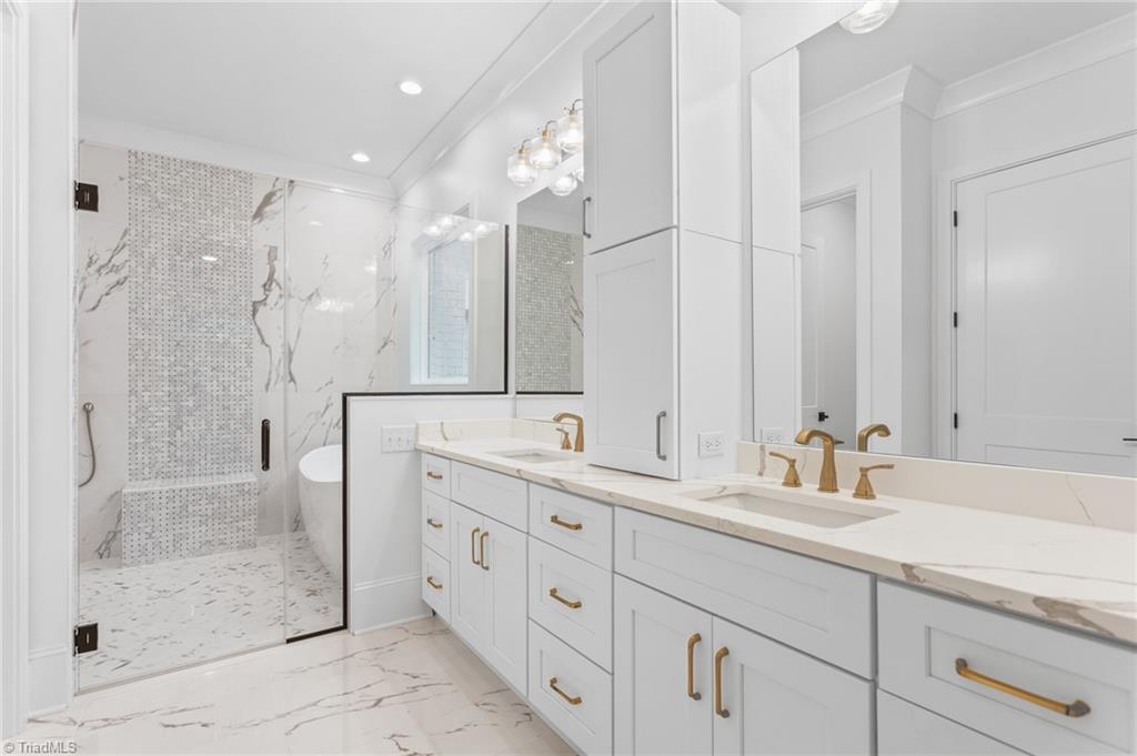 8015 Cranston Court Oak Ridge, NC 27310 - Photo 4 of 46 primary en suite with wet room