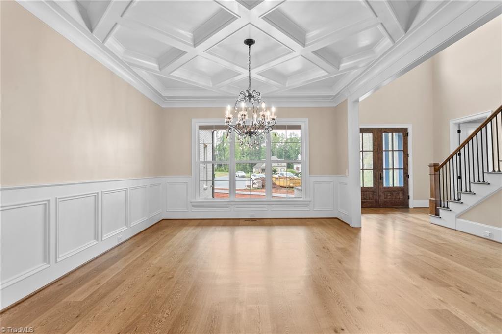 8015 Cranston Court Oak Ridge, NC 27310 - Photo 5 of 46 dining room with coffered ceiling