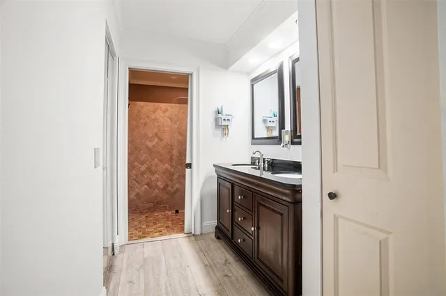 a kitchen with stainless steel appliances granite countertop a stove and a refrigerator