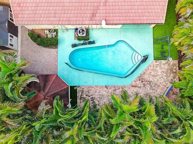 an aerial view of a backyard