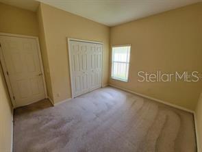 11637 Great Commission Way Orlando, FL 32832 - Photo 12 of 19 a view of an empty room with a window