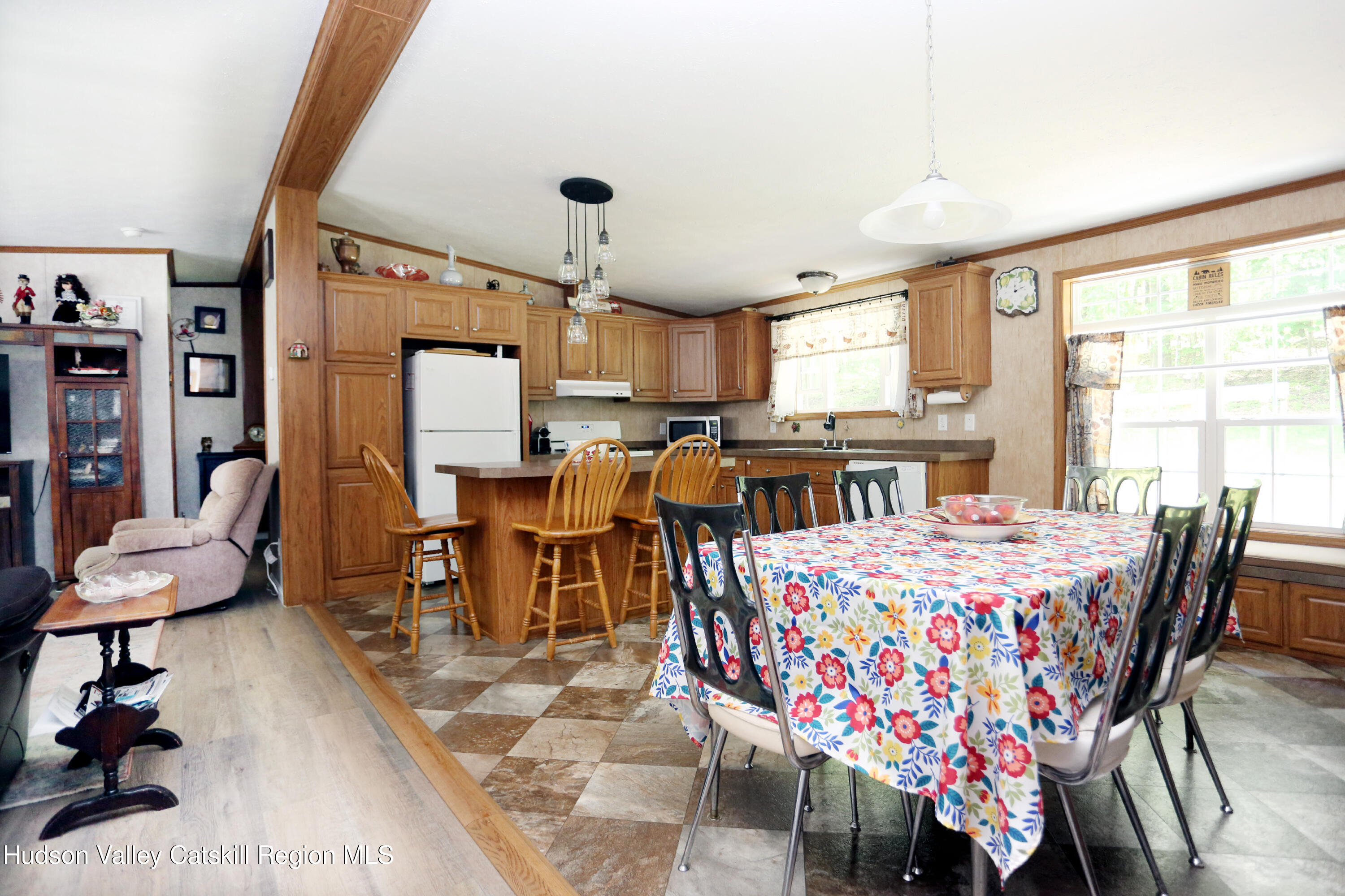219 Edison Timmerman Road Cairo, NY 12413 - Photo 13 of 51 a large kitchen with a table and chairs