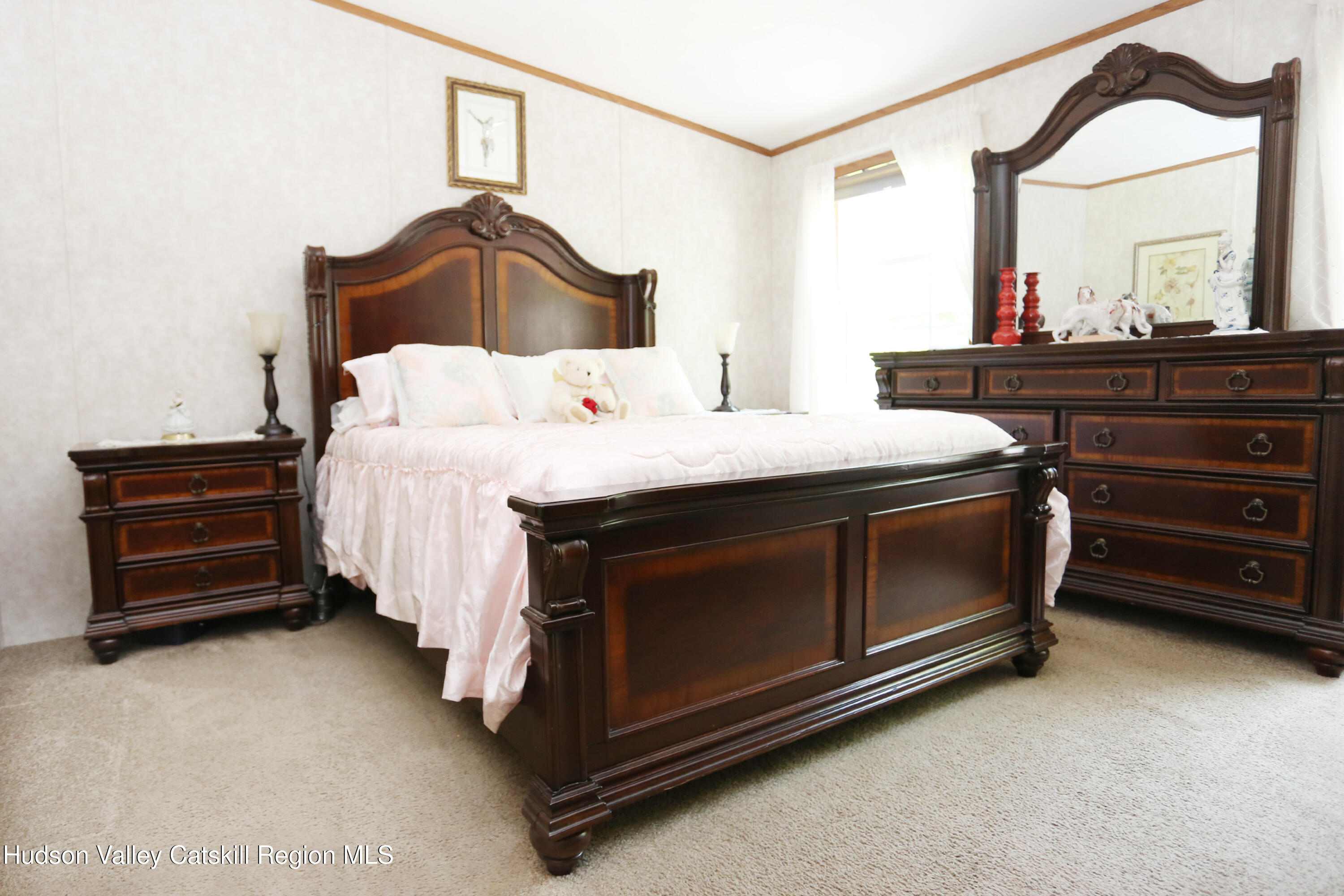 219 Edison Timmerman Road Cairo, NY 12413 - Photo 19 of 51 a bedroom with a bed and a dresser