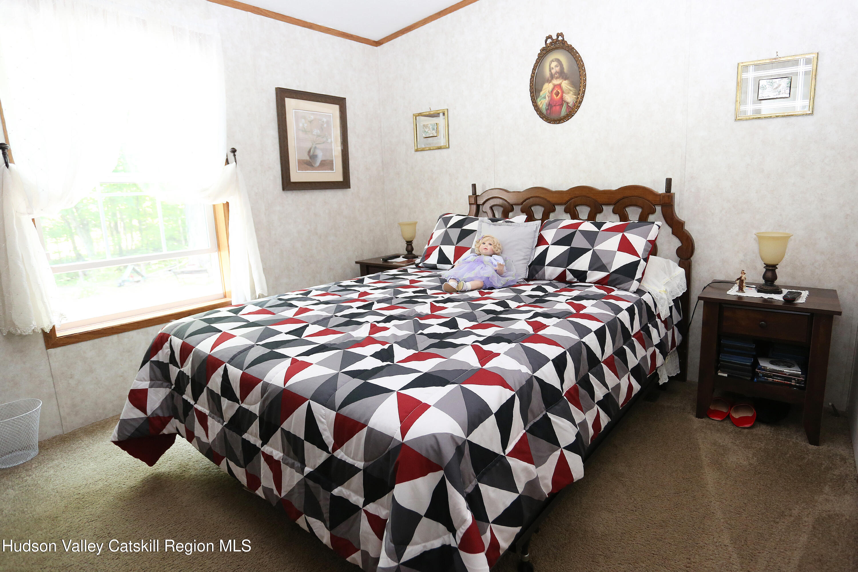 219 Edison Timmerman Road Cairo, NY 12413 - Photo 22 of 51 a bedroom with a bed and a window