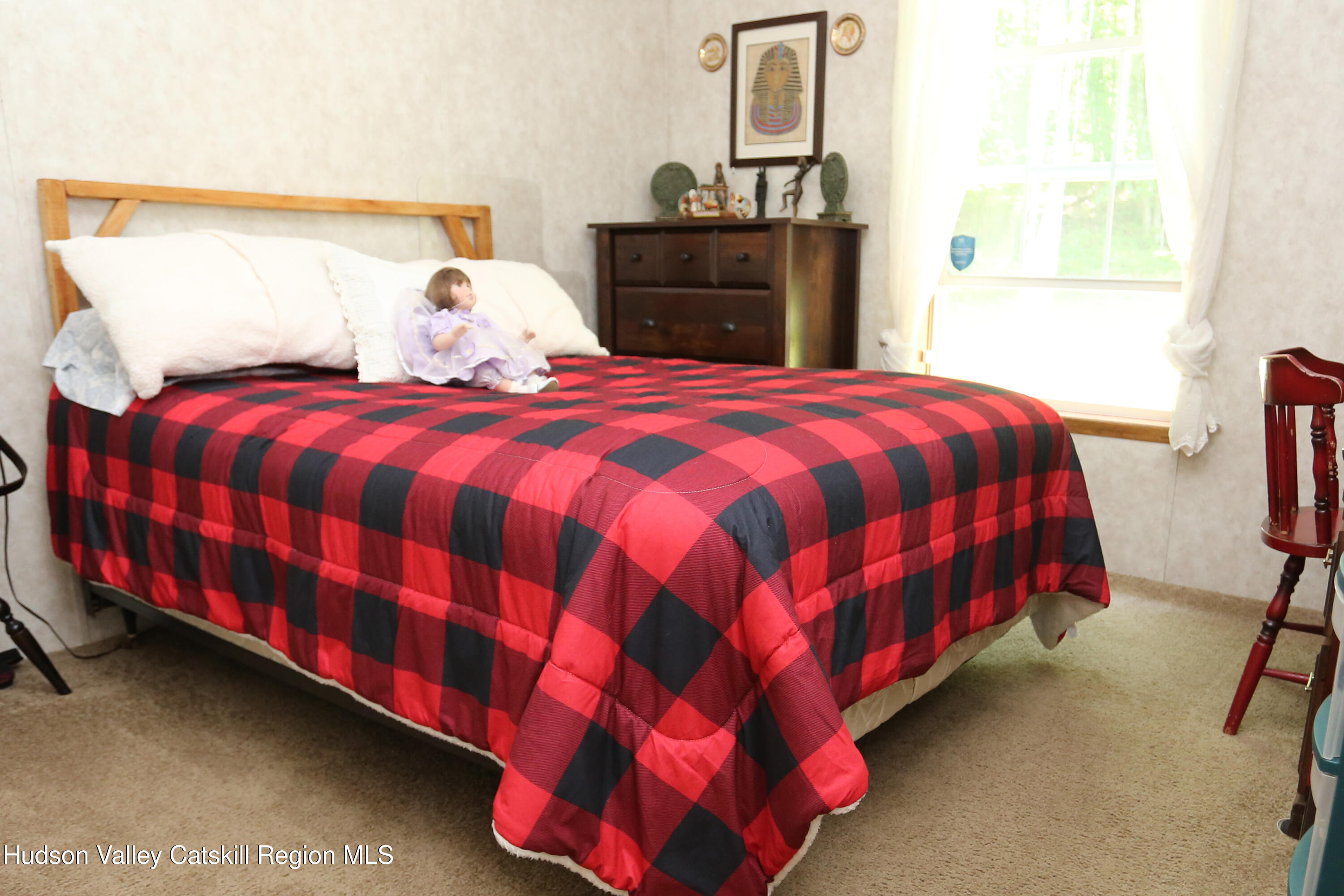 219 Edison Timmerman Road Cairo, NY 12413 - Photo 23 of 51 a bedroom with a bed and dresser