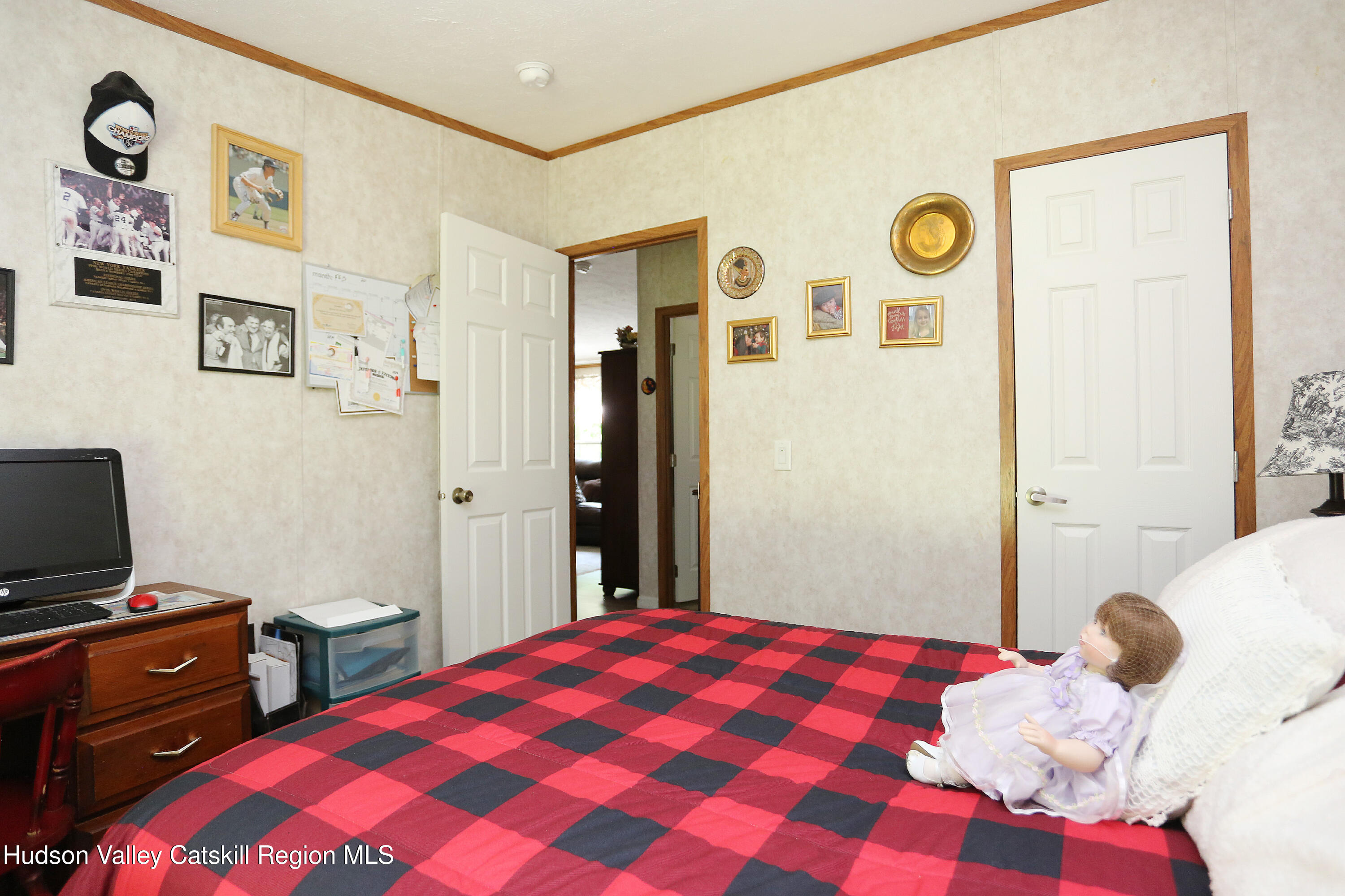 219 Edison Timmerman Road Cairo, NY 12413 - Photo 24 of 51 a bedroom with a bed and a cabinets