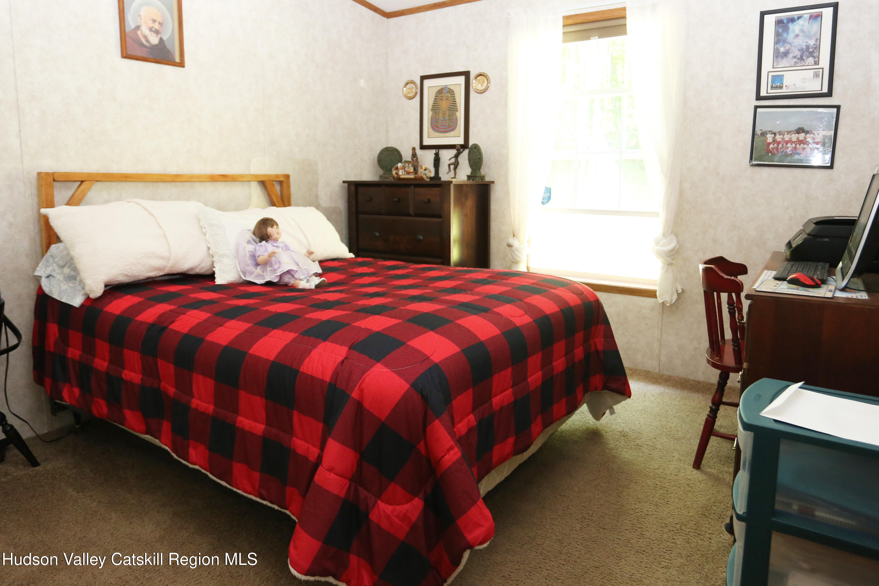 219 Edison Timmerman Road Cairo, NY 12413 - Photo 25 of 51 a bedroom with a bed and chair