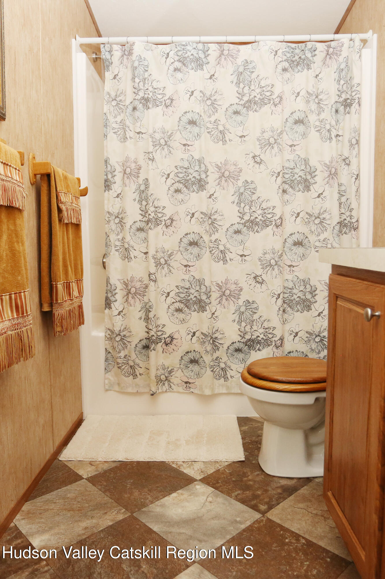 219 Edison Timmerman Road Cairo, NY 12413 - Photo 27 of 51 a white toilet sitting next to a shower curtain